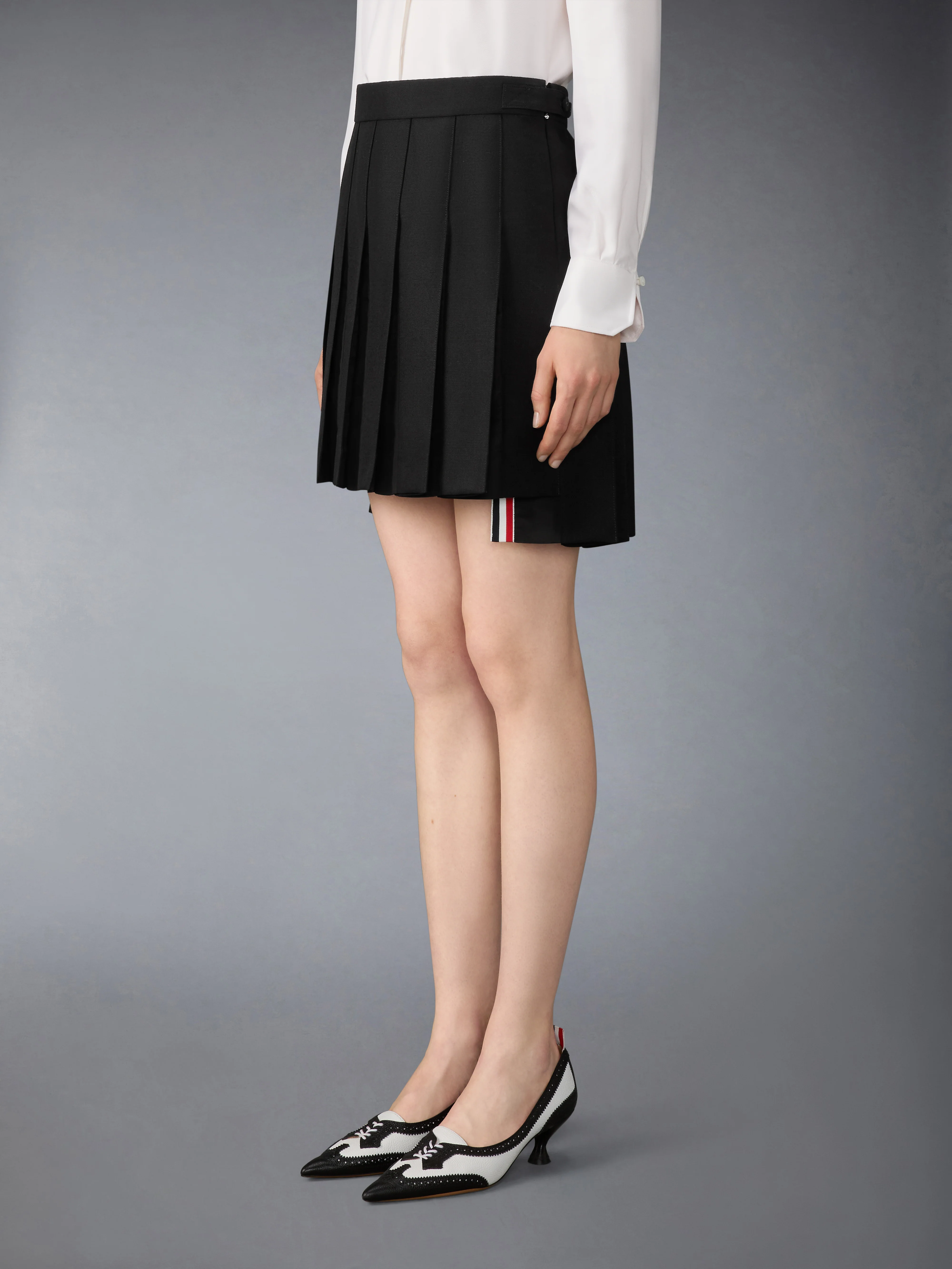 1-3-ply-wool-mohair-pleated-mini-skirt-3.webp 3-PLY WOOL MOHAIR PLEATED MINI SKIRT
