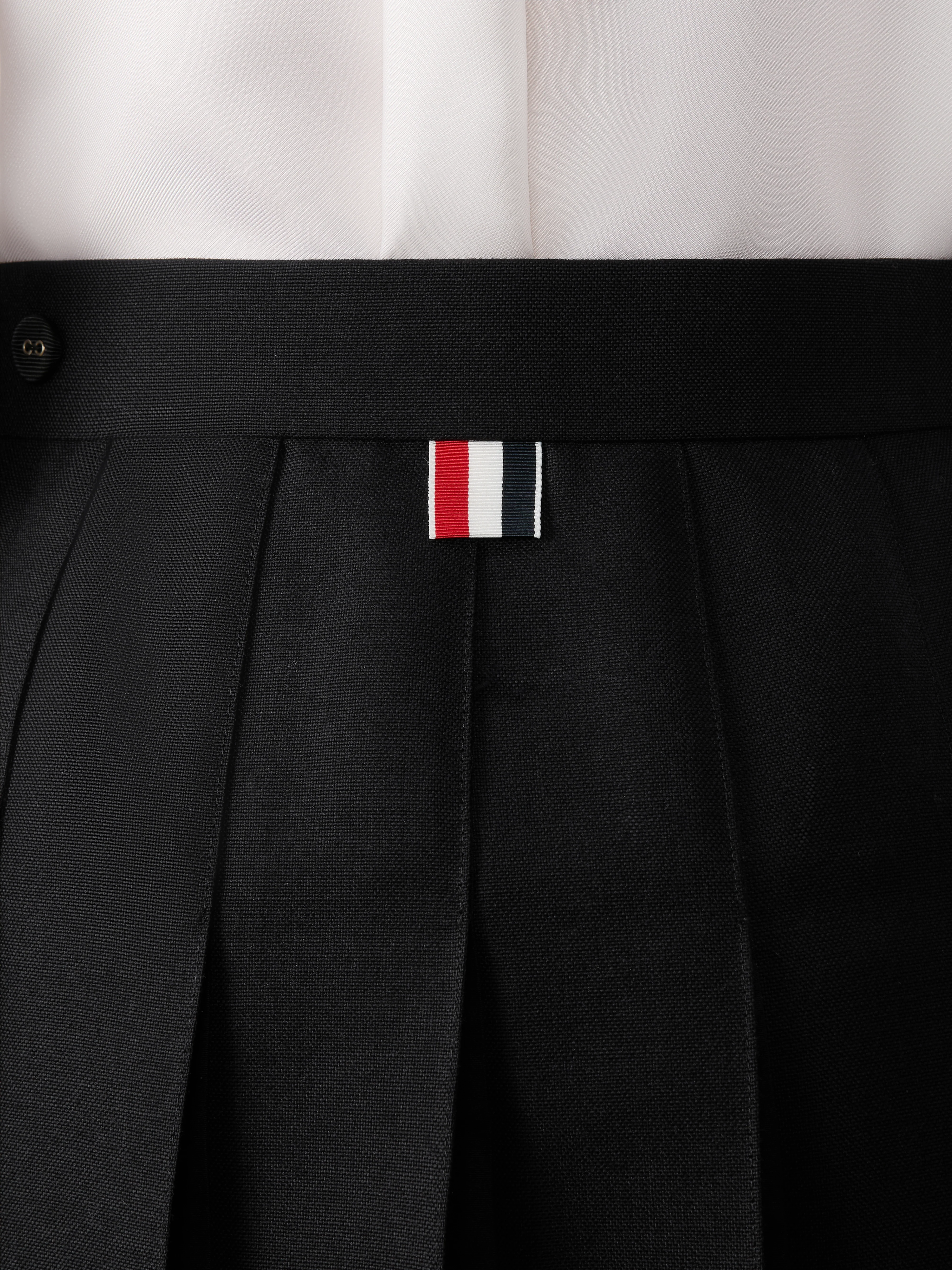 1-3-ply-wool-mohair-pleated-mini-skirt-6.webp 3-PLY WOOL MOHAIR PLEATED MINI SKIRT