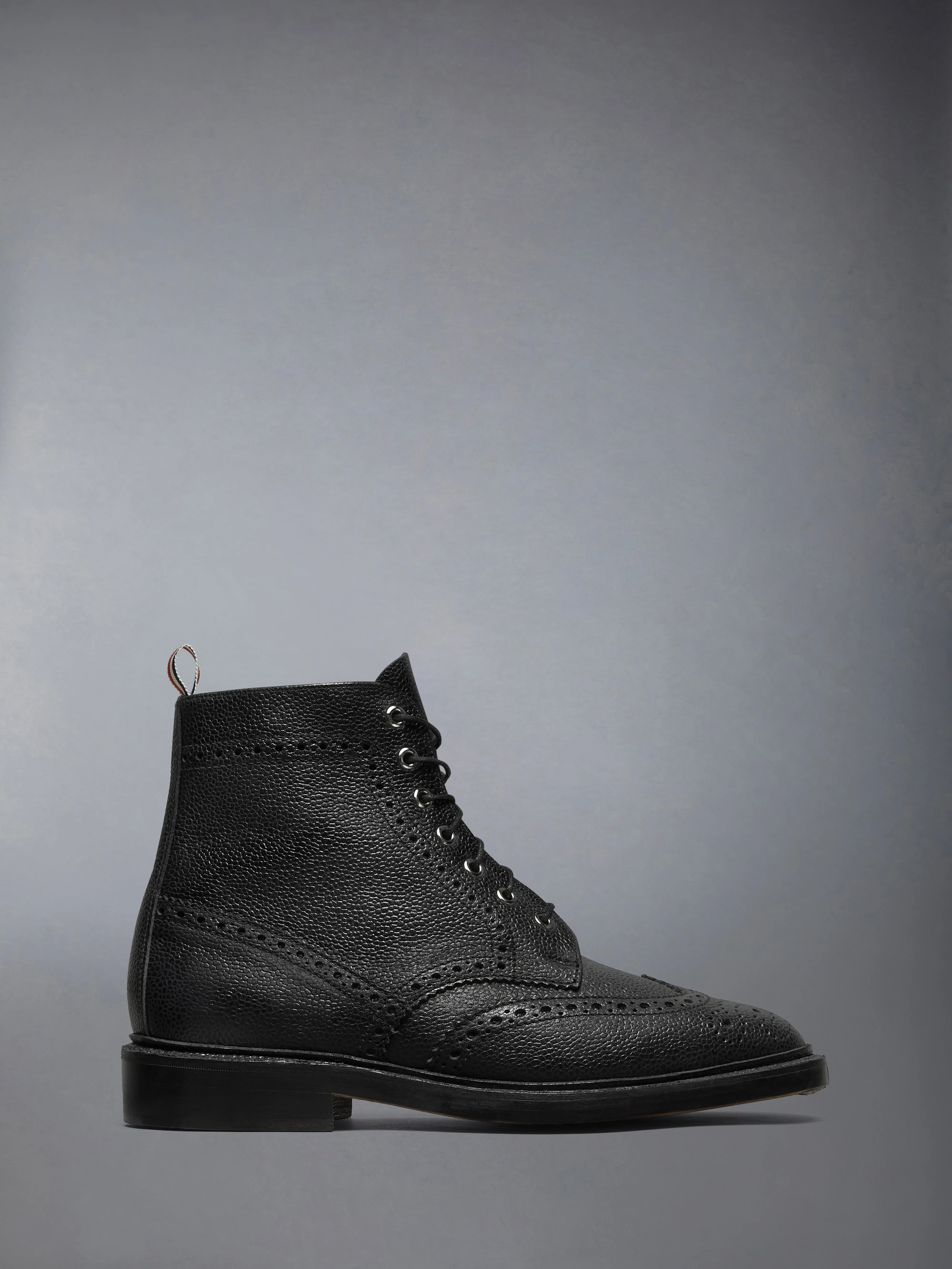 PEBBLE GRAIN LEATHER SOLE WINGTIP BOOT