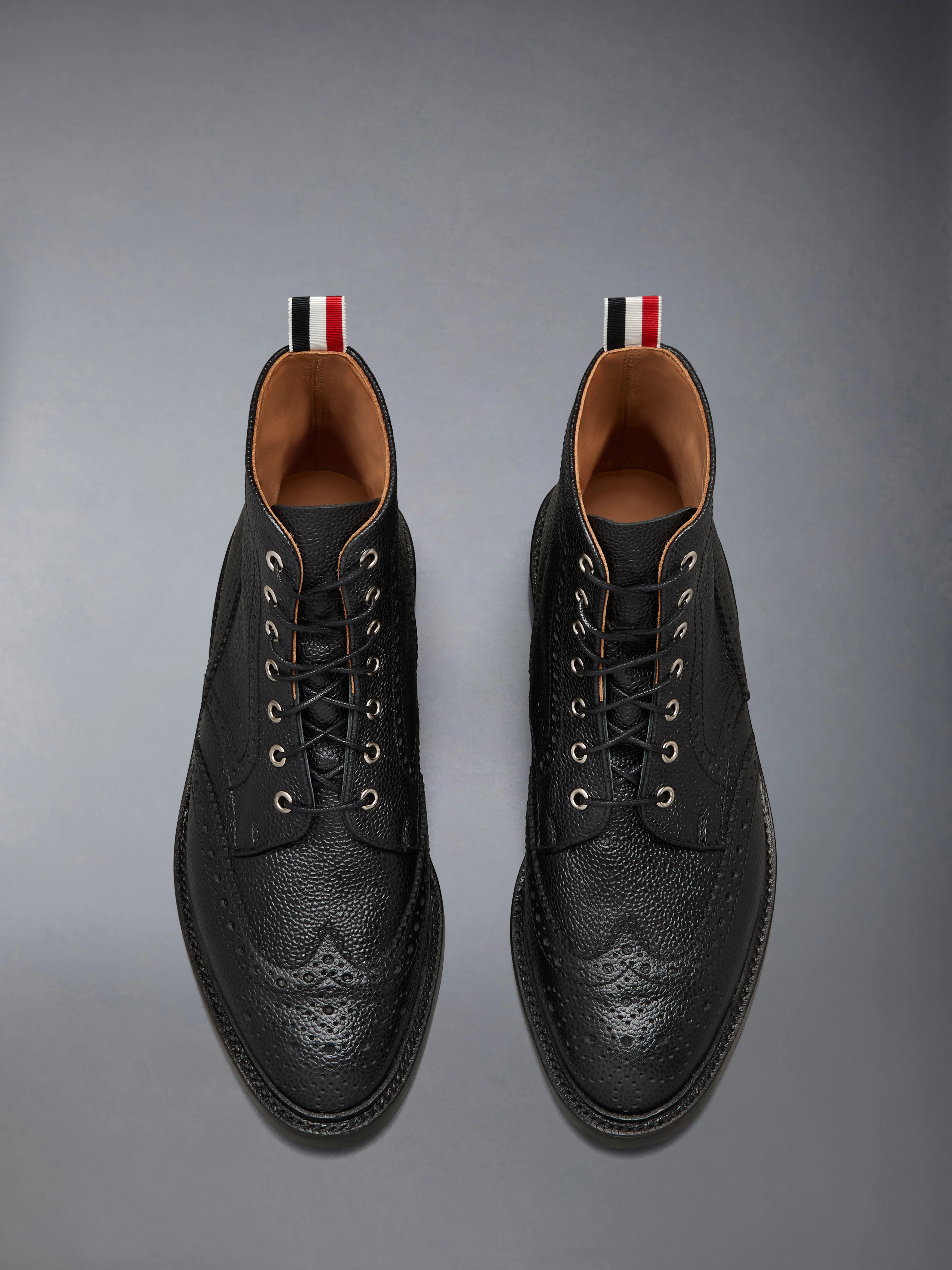 10200-pebble-grain-leather-sole-wingtip-boot-4.webp PEBBLE GRAIN LEATHER SOLE WINGTIP BOOT