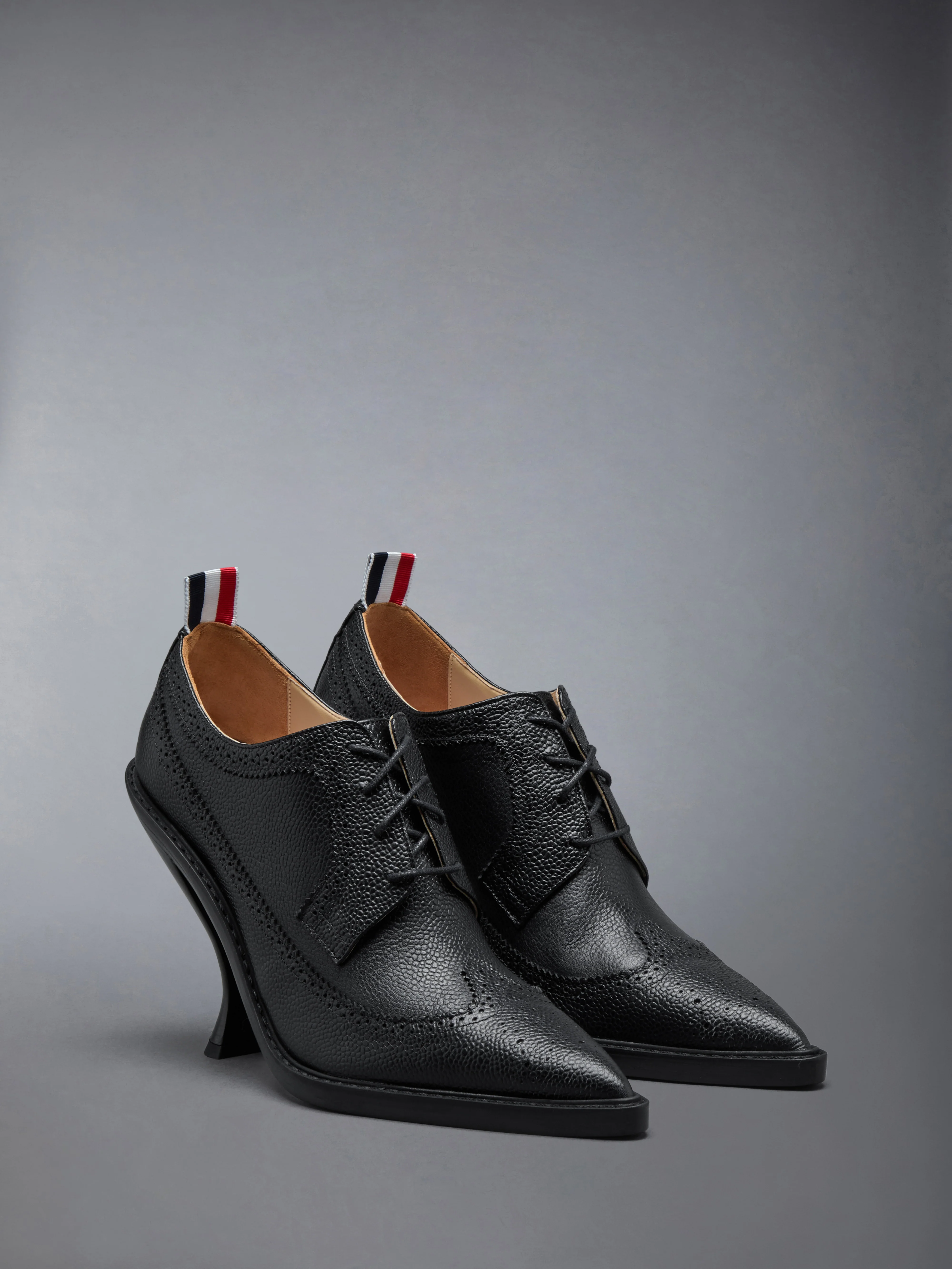 10297-pebble-grain-longwing-heeled-brogue-105mm-3.webp PEBBLE GRAIN LONGWING HEELED BROGUE 105MM