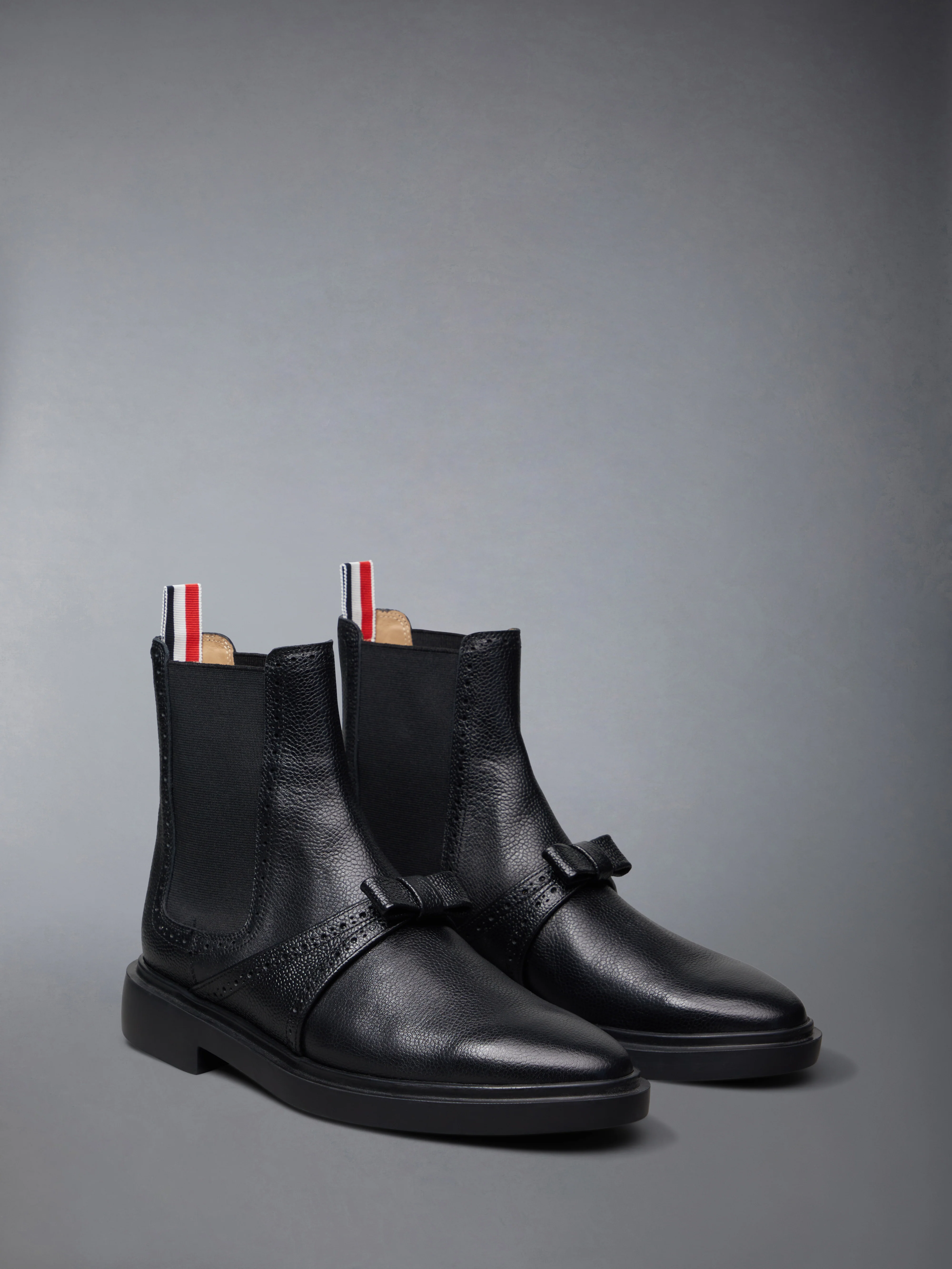 PEBBLE GRAIN RUBBER SOLE BROGUE BOW CHELSEA BOOT