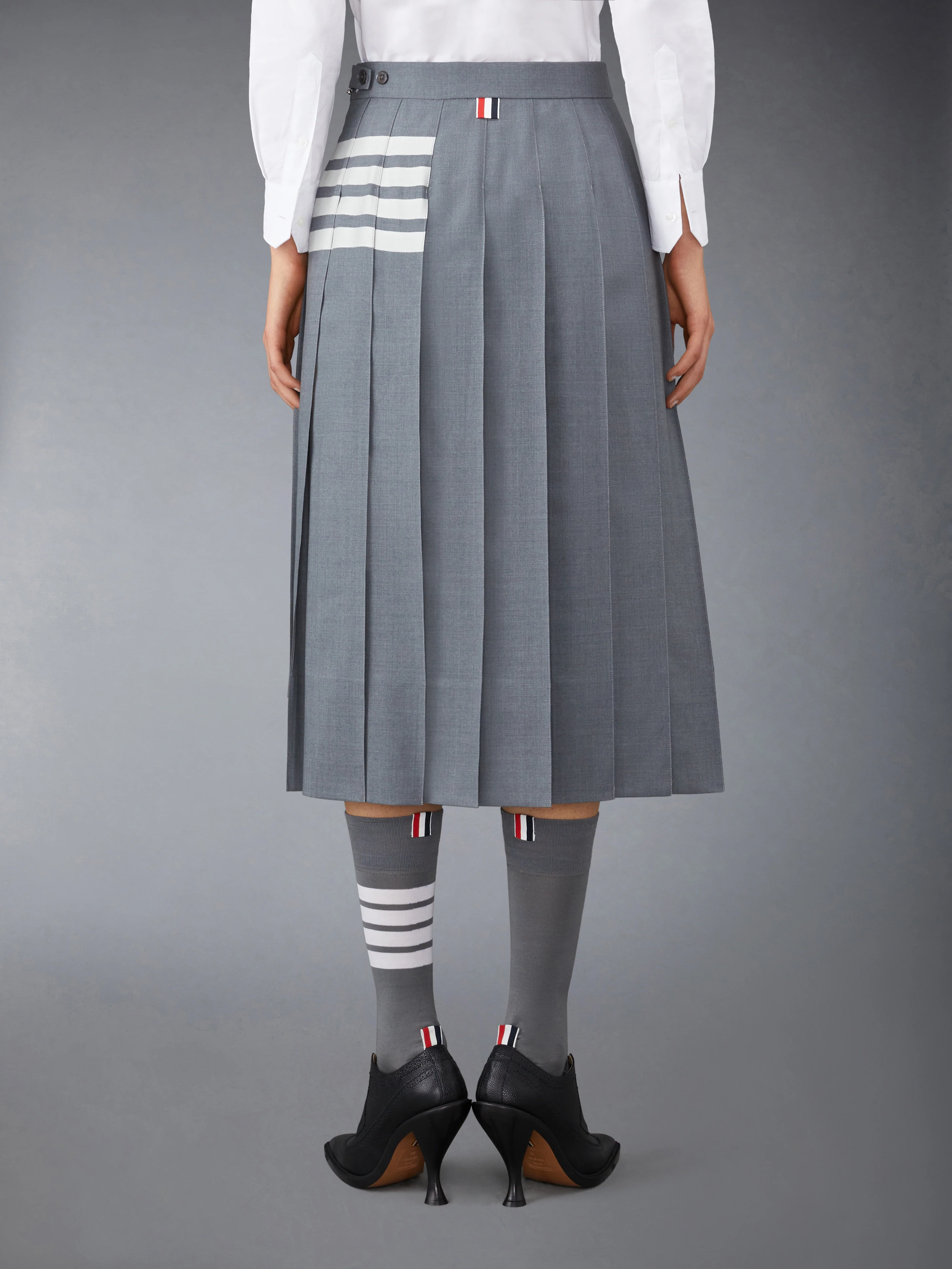 10649-plain-weave-4-bar-midi-pleated-skirt-3.webp PLAIN WEAVE 4-BAR MIDI PLEATED SKIRT