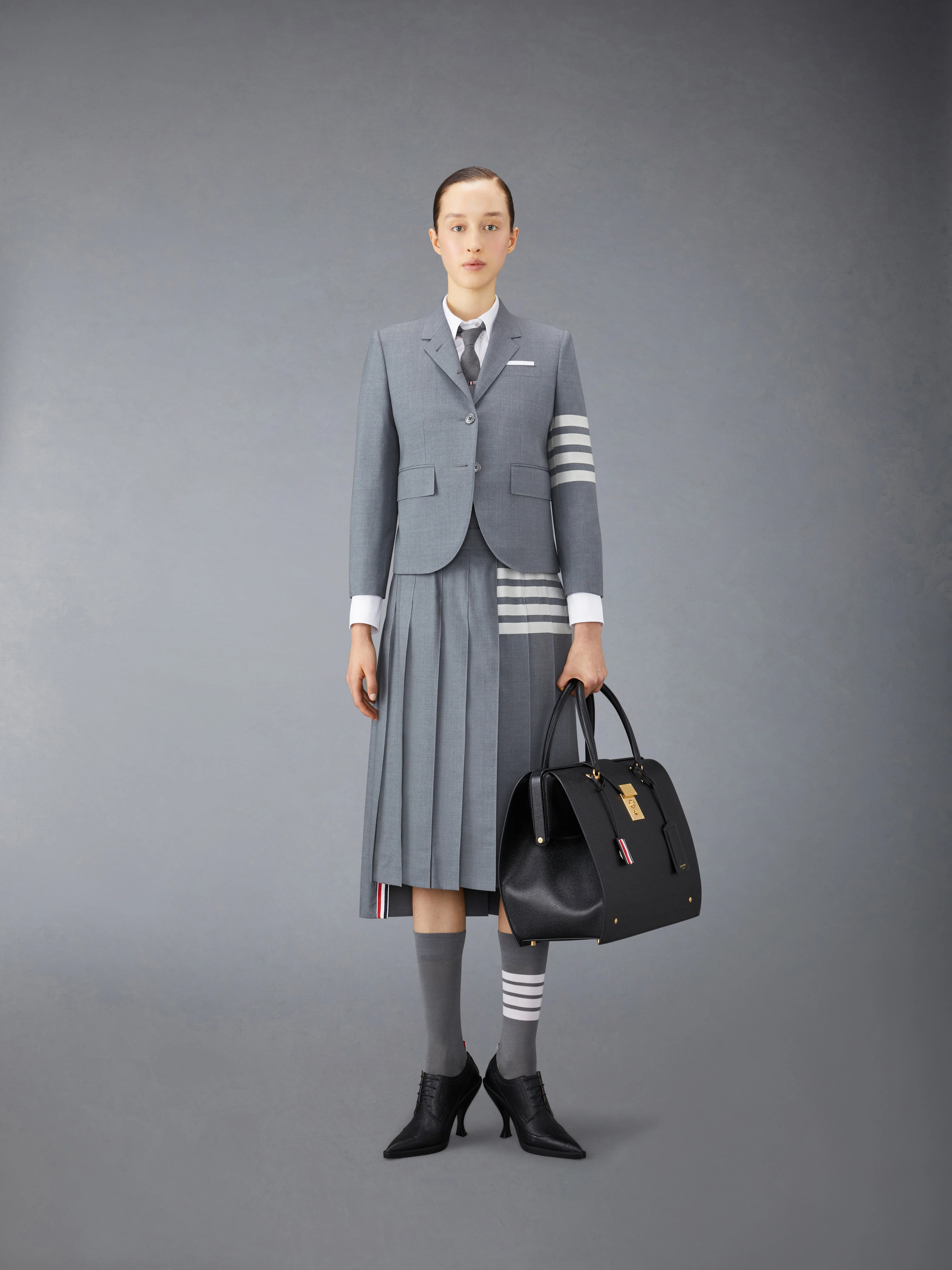 10649-plain-weave-4-bar-midi-pleated-skirt-4.webp PLAIN WEAVE 4-BAR MIDI PLEATED SKIRT