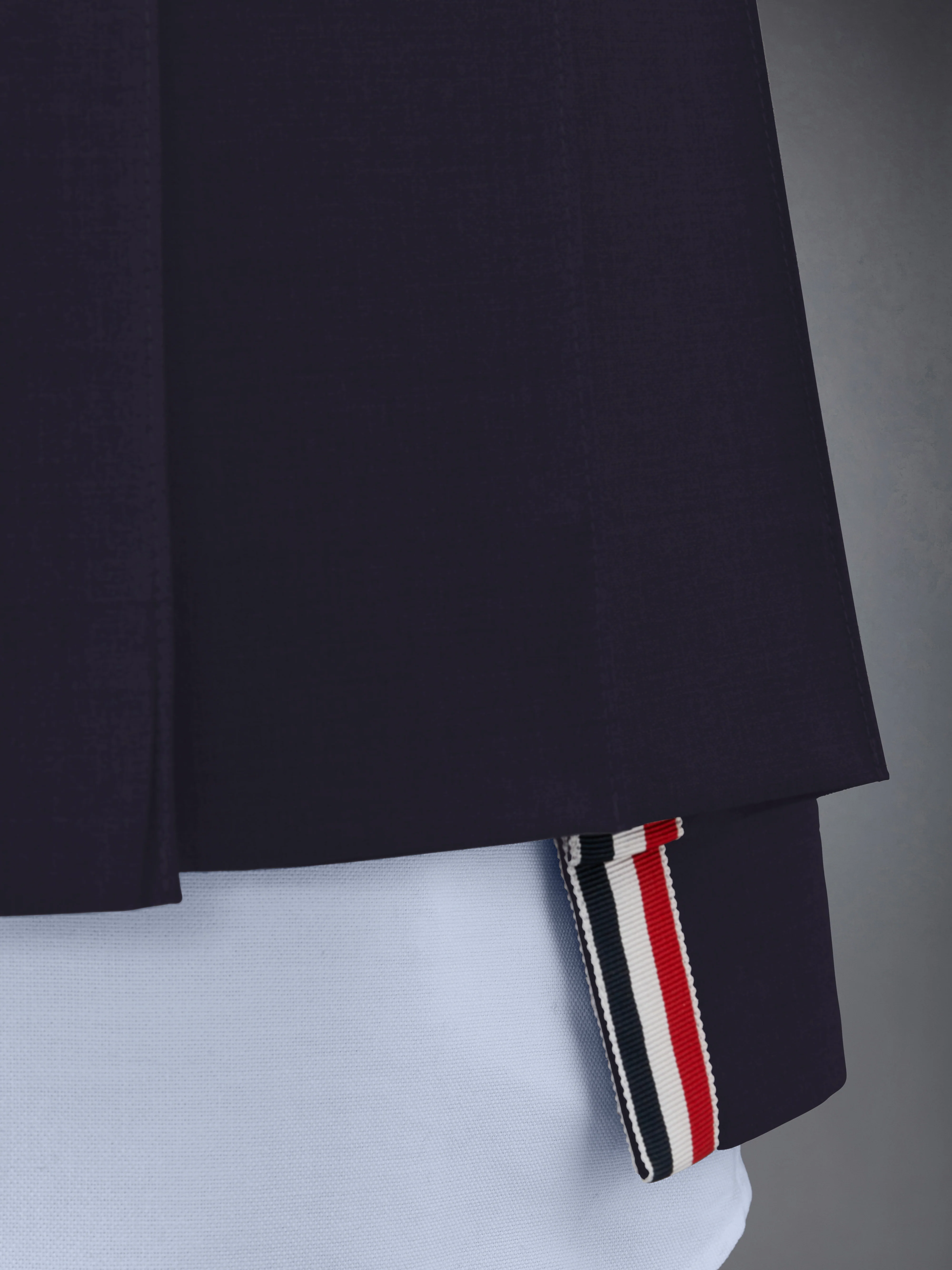 10676-plain-weave-4-bar-mini-pleated-skirt-5.webp PLAIN WEAVE 4-BAR MINI PLEATED SKIRT
