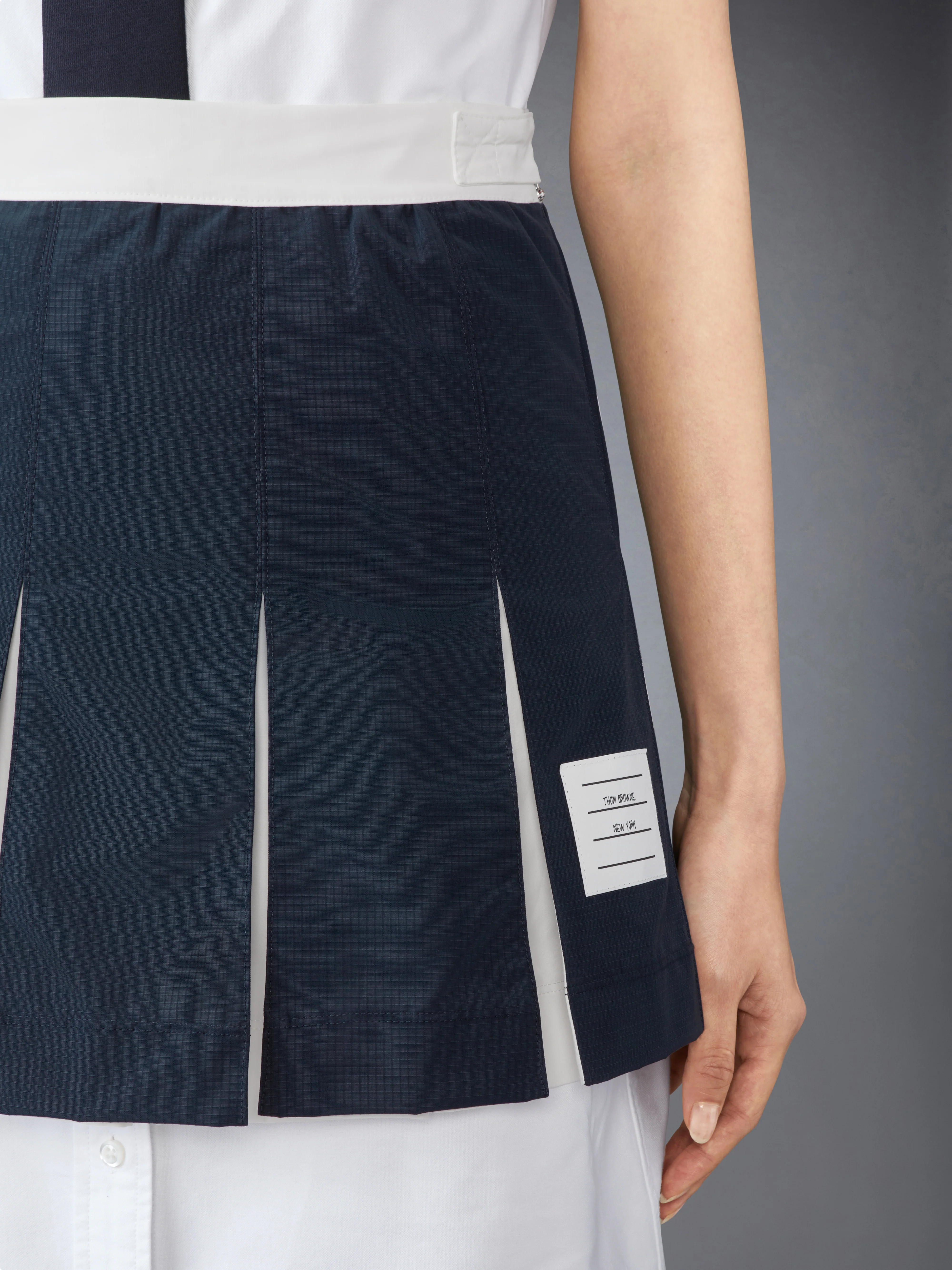 11069-ripstop-box-pleat-mini-skirt-5.webp RIPSTOP BOX PLEAT MINI SKIRT