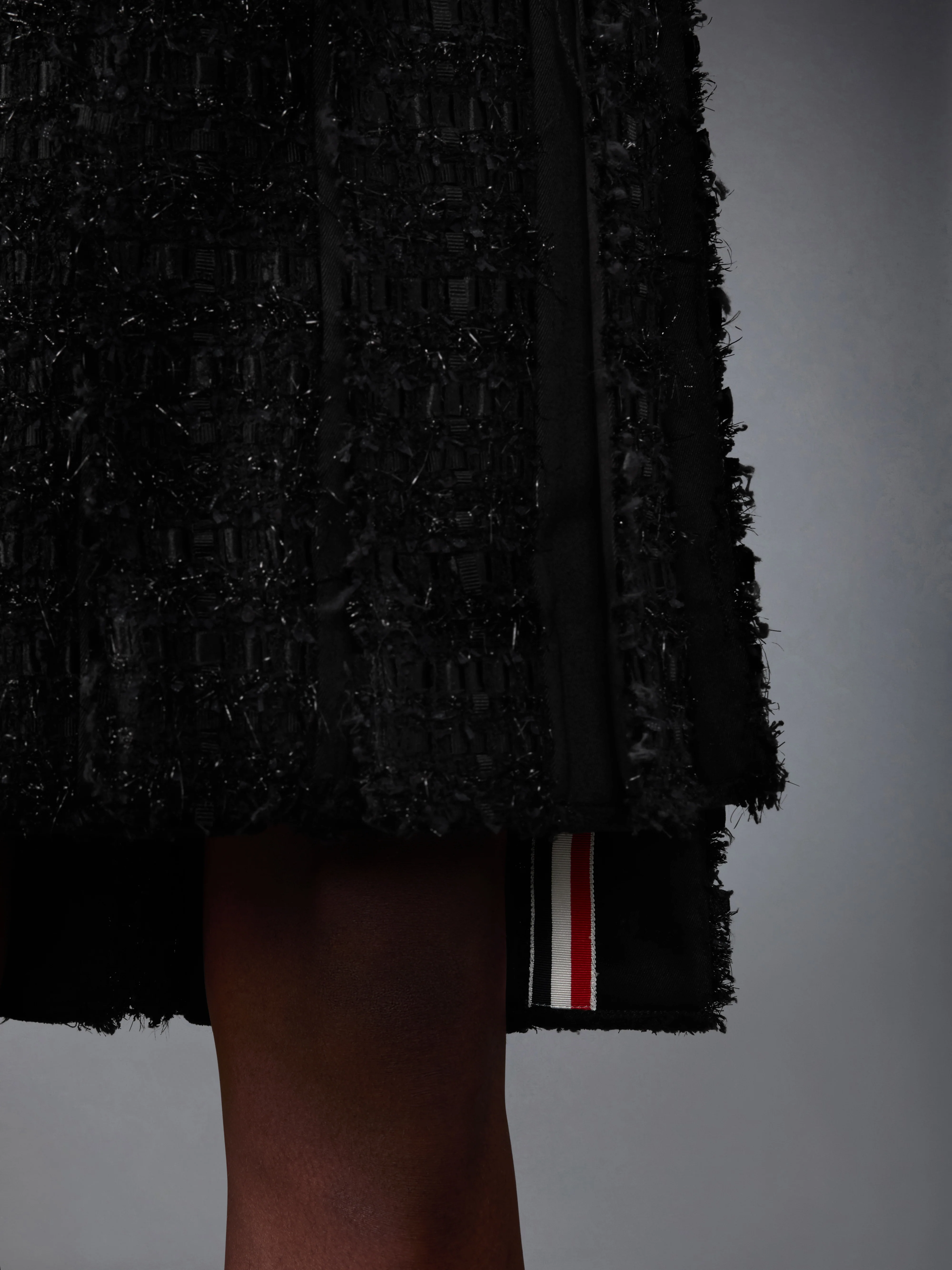 11282-satin-ribbon-tweed-frayed-pleated-skirt-6.webp SATIN RIBBON TWEED FRAYED PLEATED SKIRT