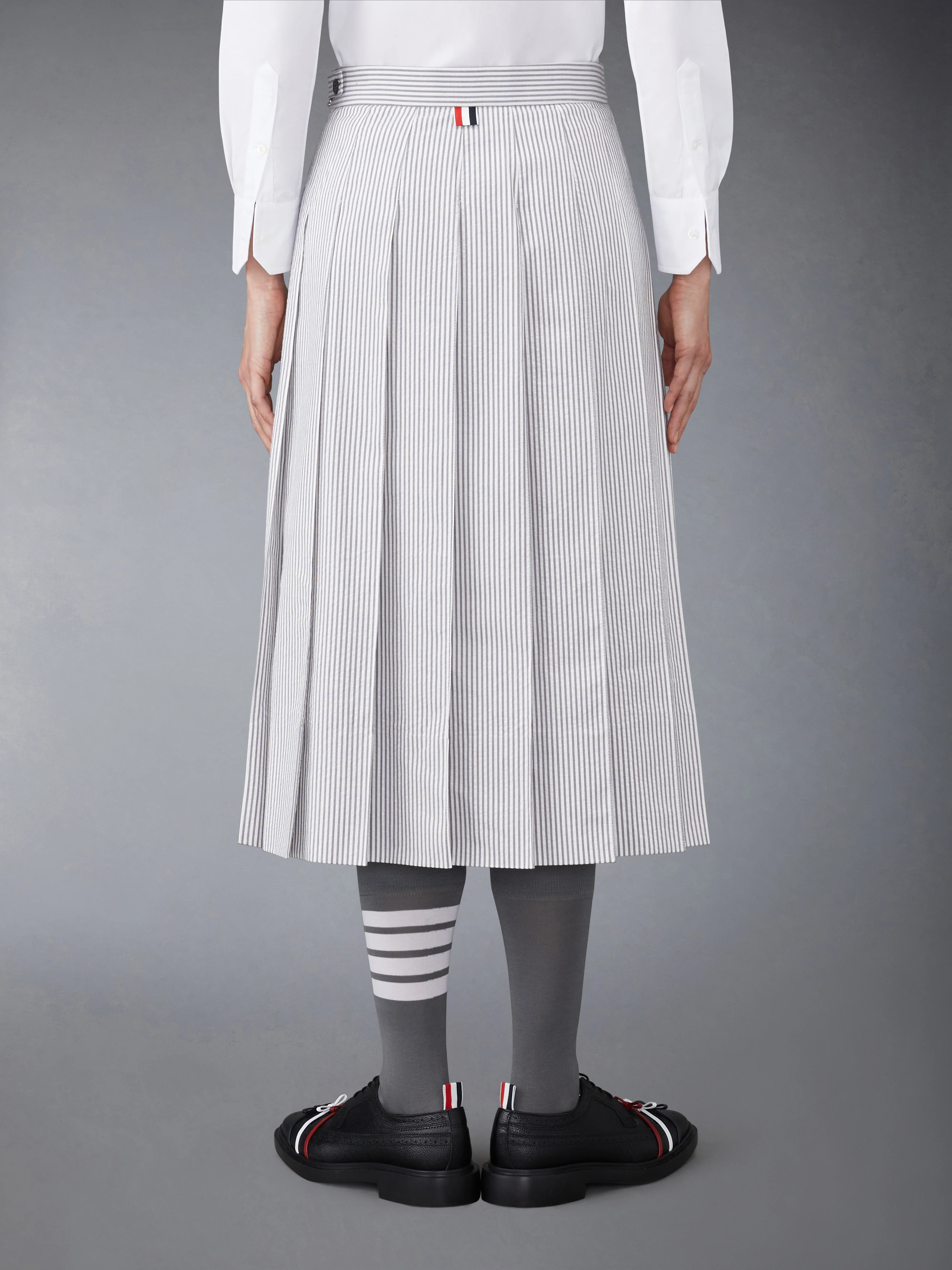 11588-seersucker-midi-pleated-skirt-3.webp SEERSUCKER MIDI PLEATED SKIRT