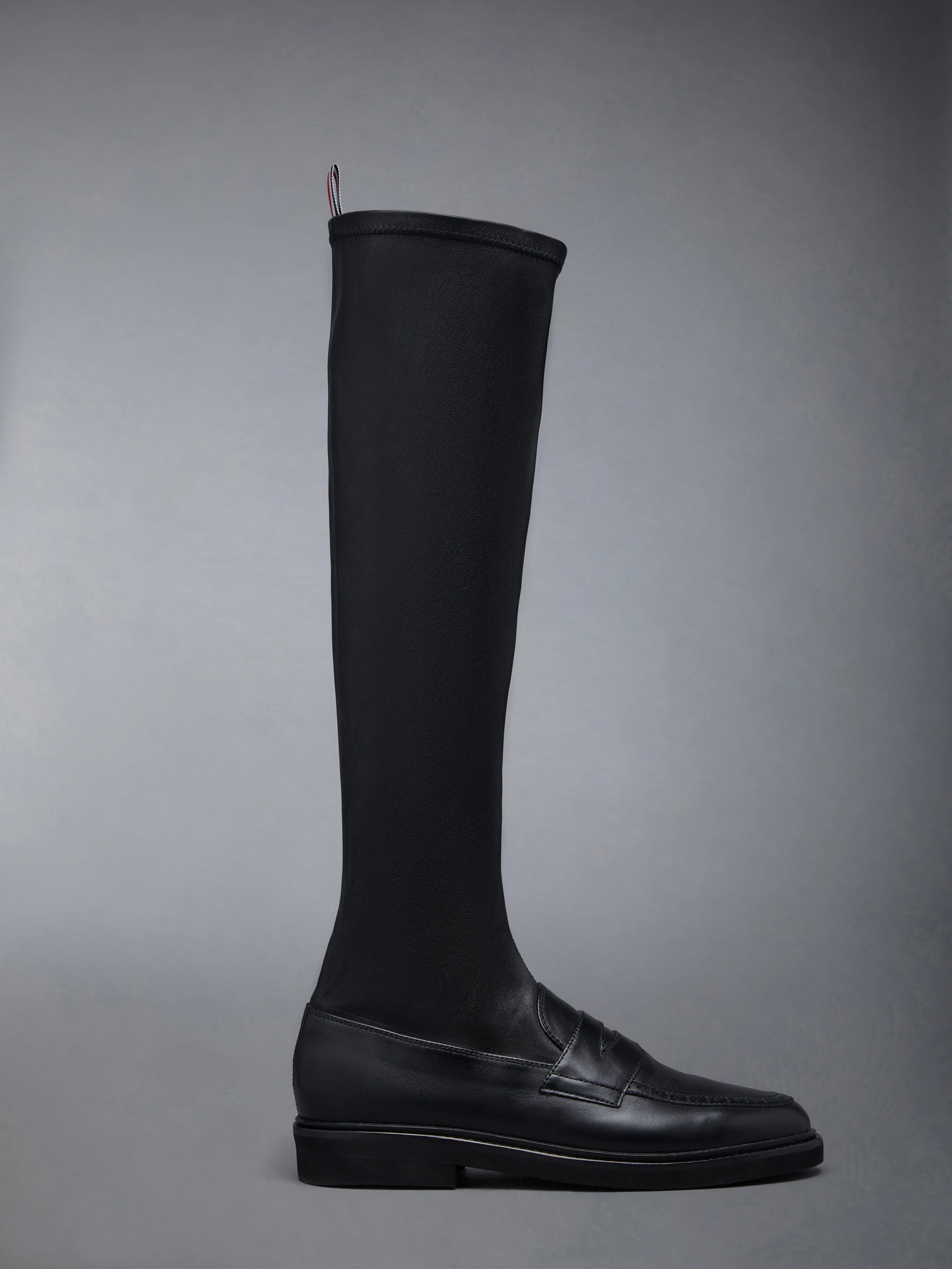 12380-stretch-vitello-calf-micro-sole-knee-high-penny-loafer-boot-1.webp Stretch Vitello Calf Micro Sole Knee High Penny Loafer Boot