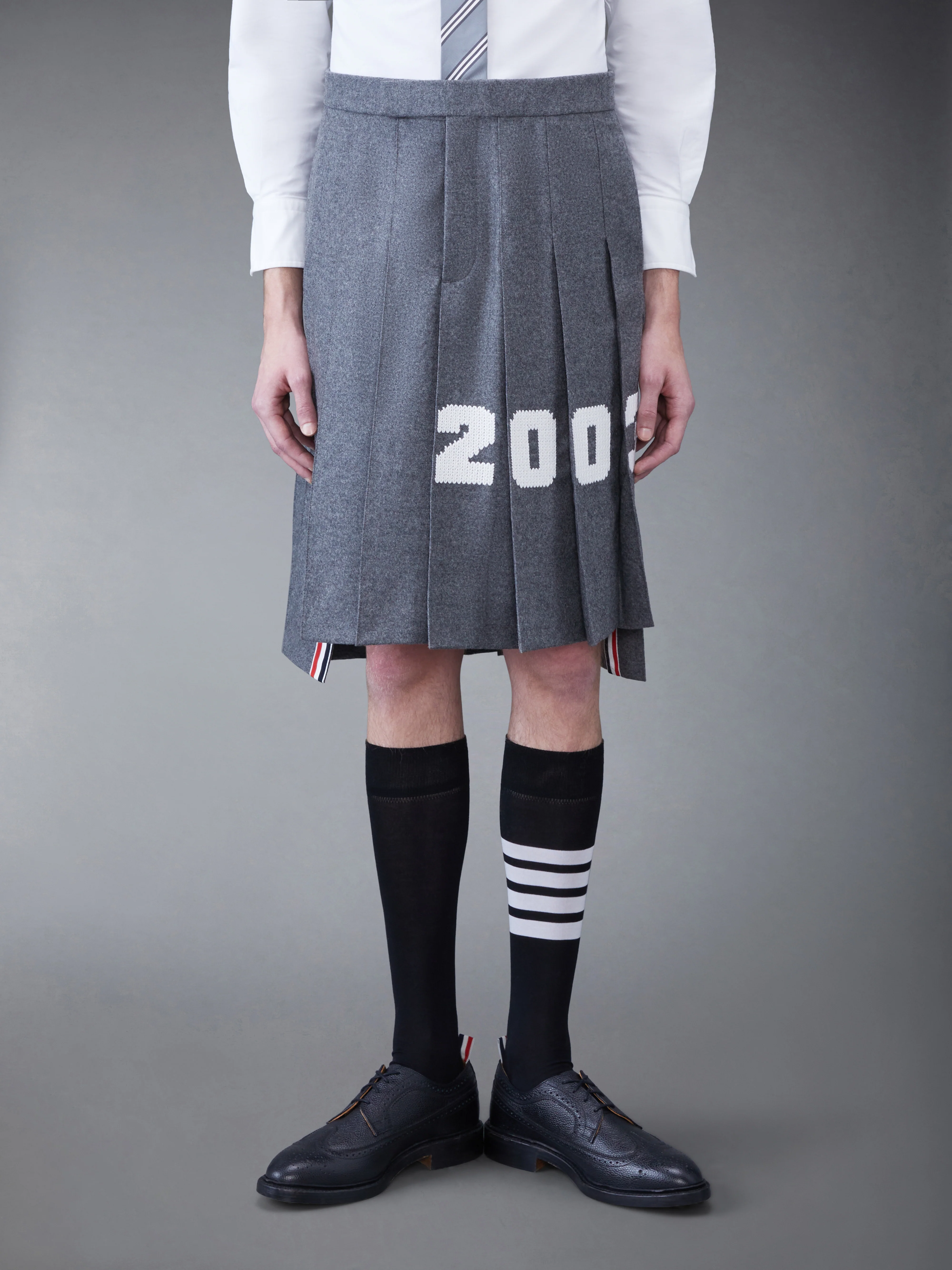 WOOL FLANNEL 2003 CLASSIC BACKSTRAP PLEATED SKIRT