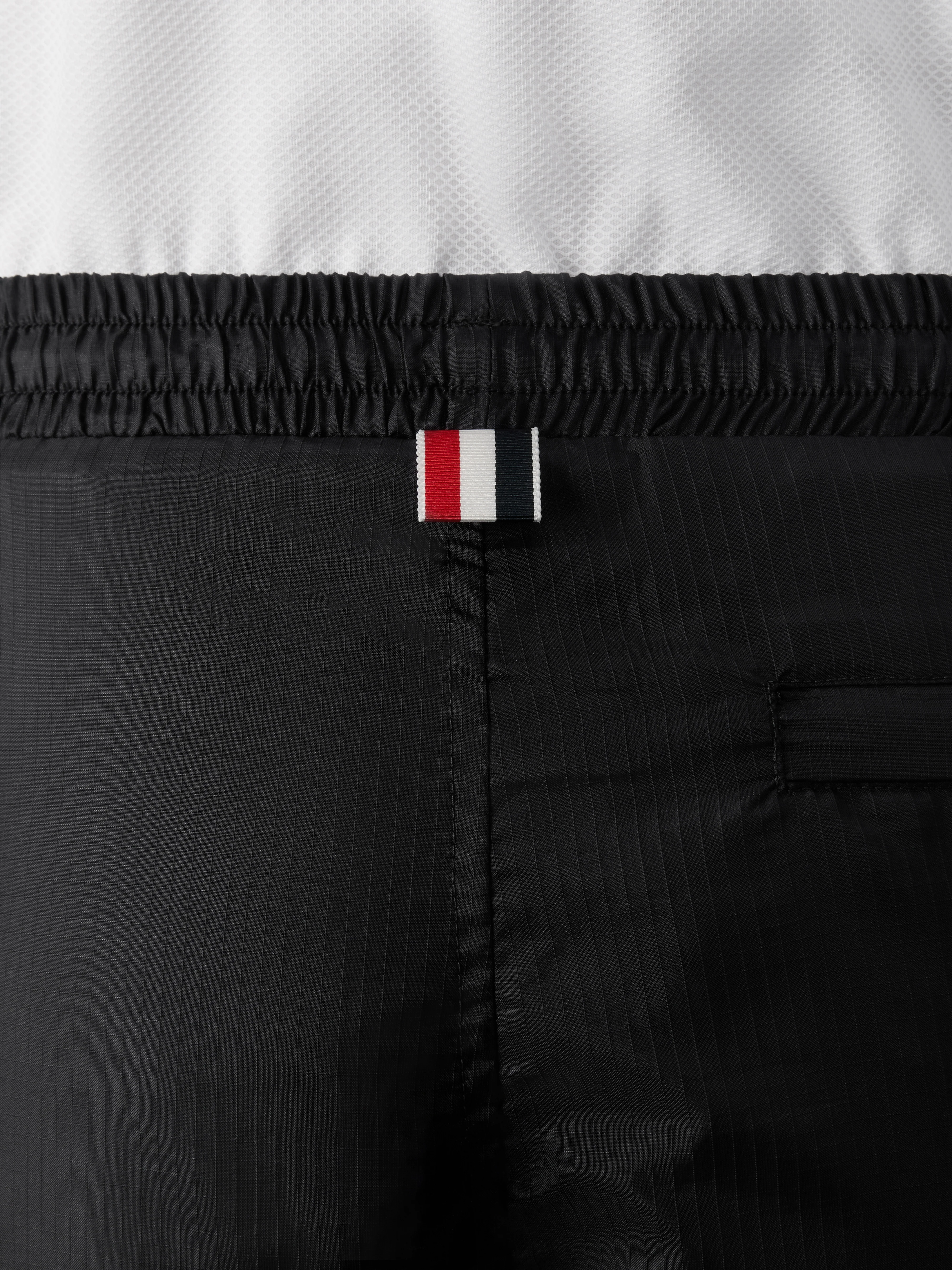 1531-shiny-ripstop-4-bar-track-pants-4.webp SHINY RIPSTOP 4-BAR TRACK PANTS