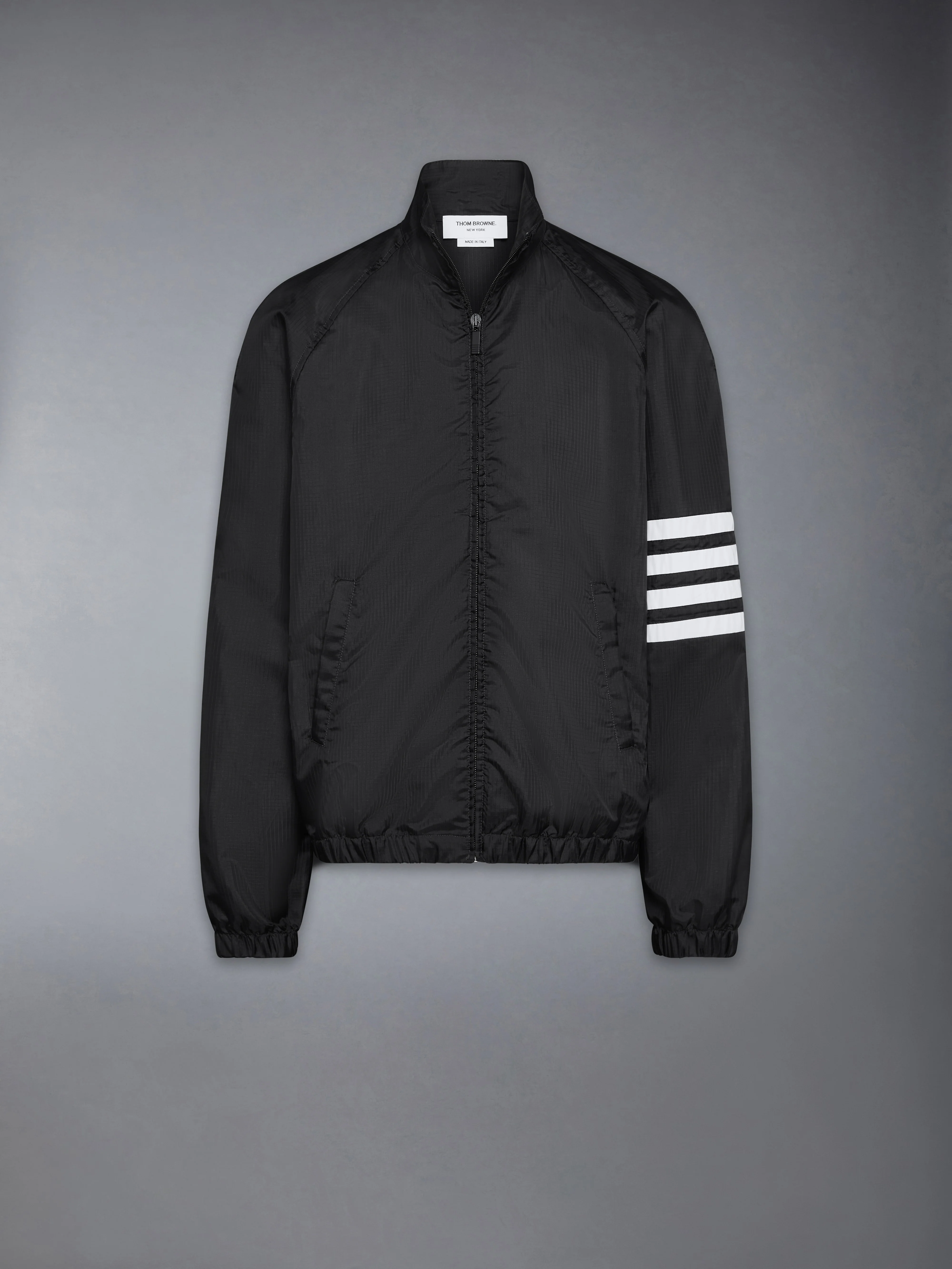1625-shiny-ripstop-raglan-4-bar-track-jacket-7.webp SHINY RIPSTOP RAGLAN 4-BAR TRACK JACKET