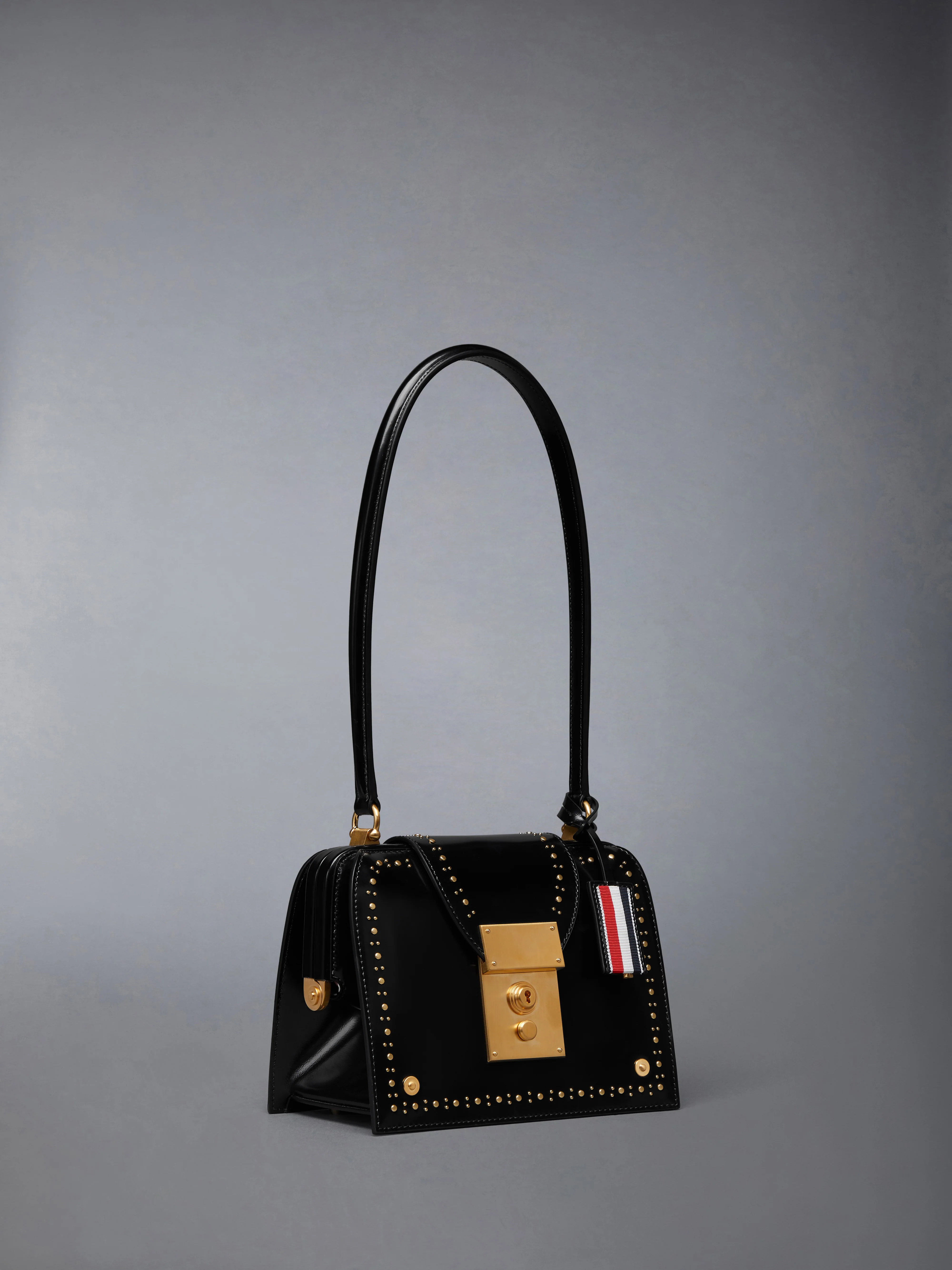 1827-soft-spazzolato-stud-mrs-thom-triangle-bag-2.webp SOFT SPAZZOLATO STUD MRS. THOM TRIANGLE BAG