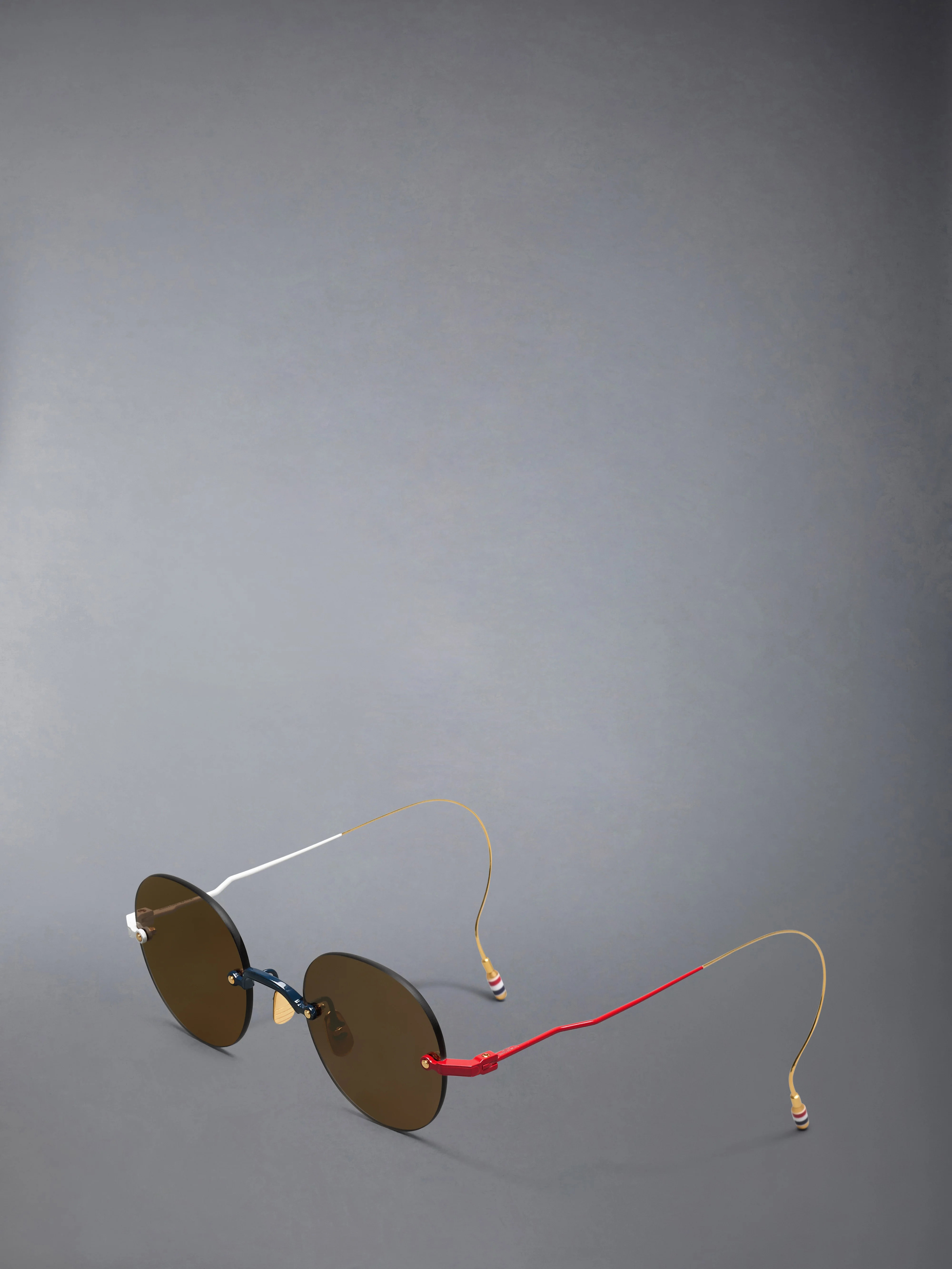 TITANIUM RIMLESS ROUND SUNGLASSES