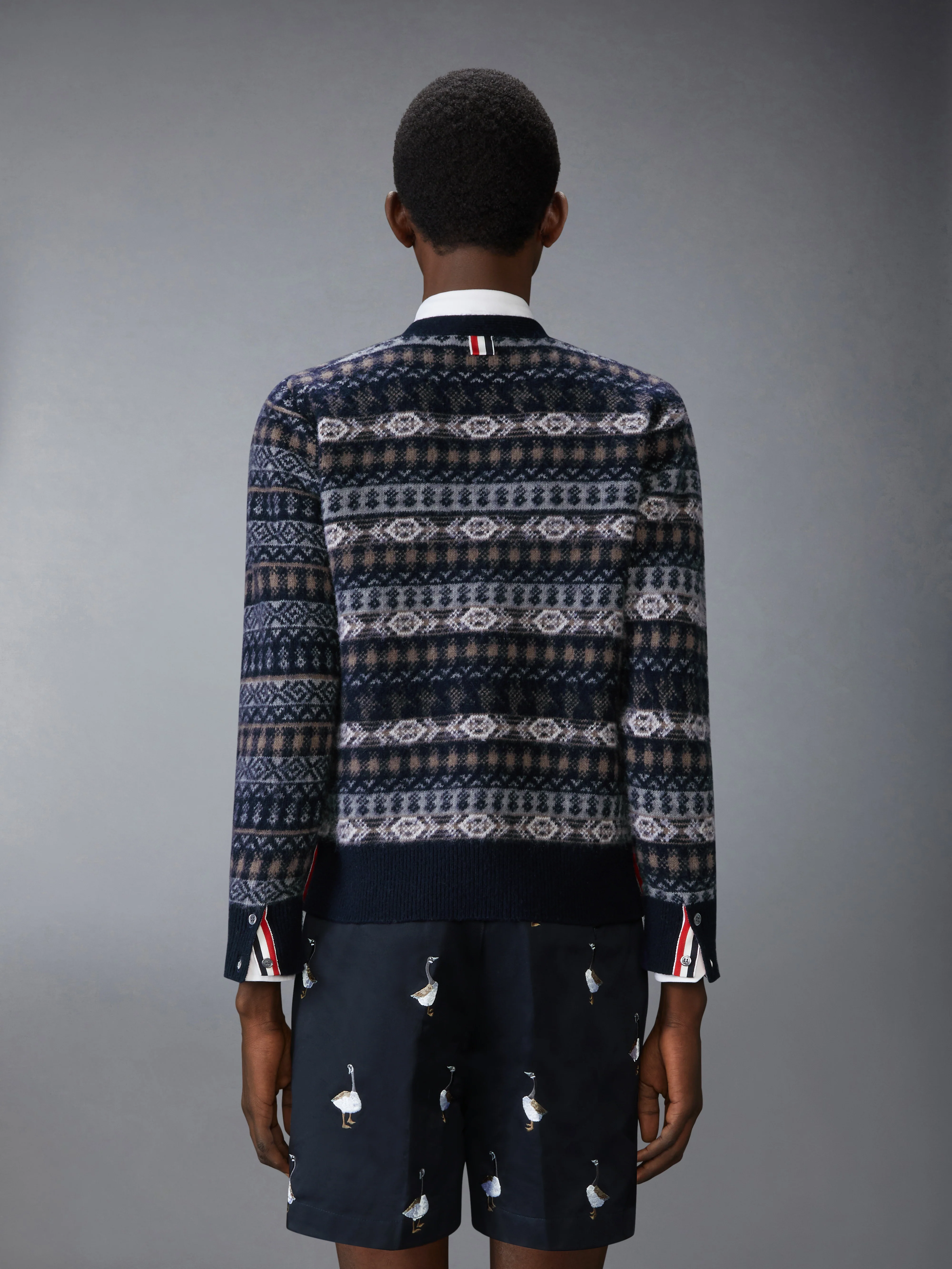 BRUSHED SHETLAND AND MERINO WOOL FUNMIX FAIR AILE JACQUARD V NECK CARDIGAN
