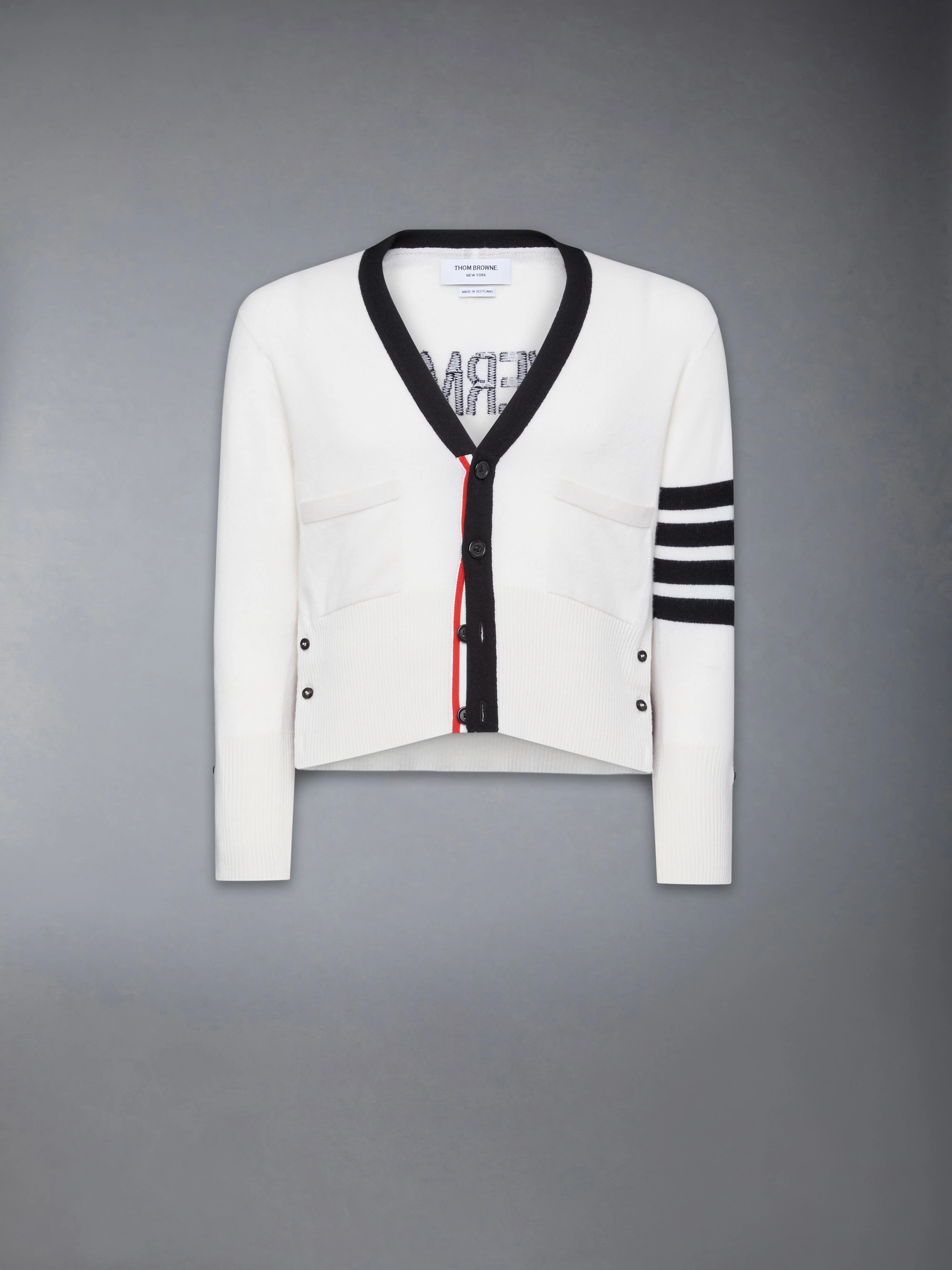 3111-cashmere-nevermore-intarsia-4-bar-classic-short-cardigan-9.webp CASHMERE NEVERMORE INTARSIA 4-BAR CLASSIC SHORT CARDIGAN