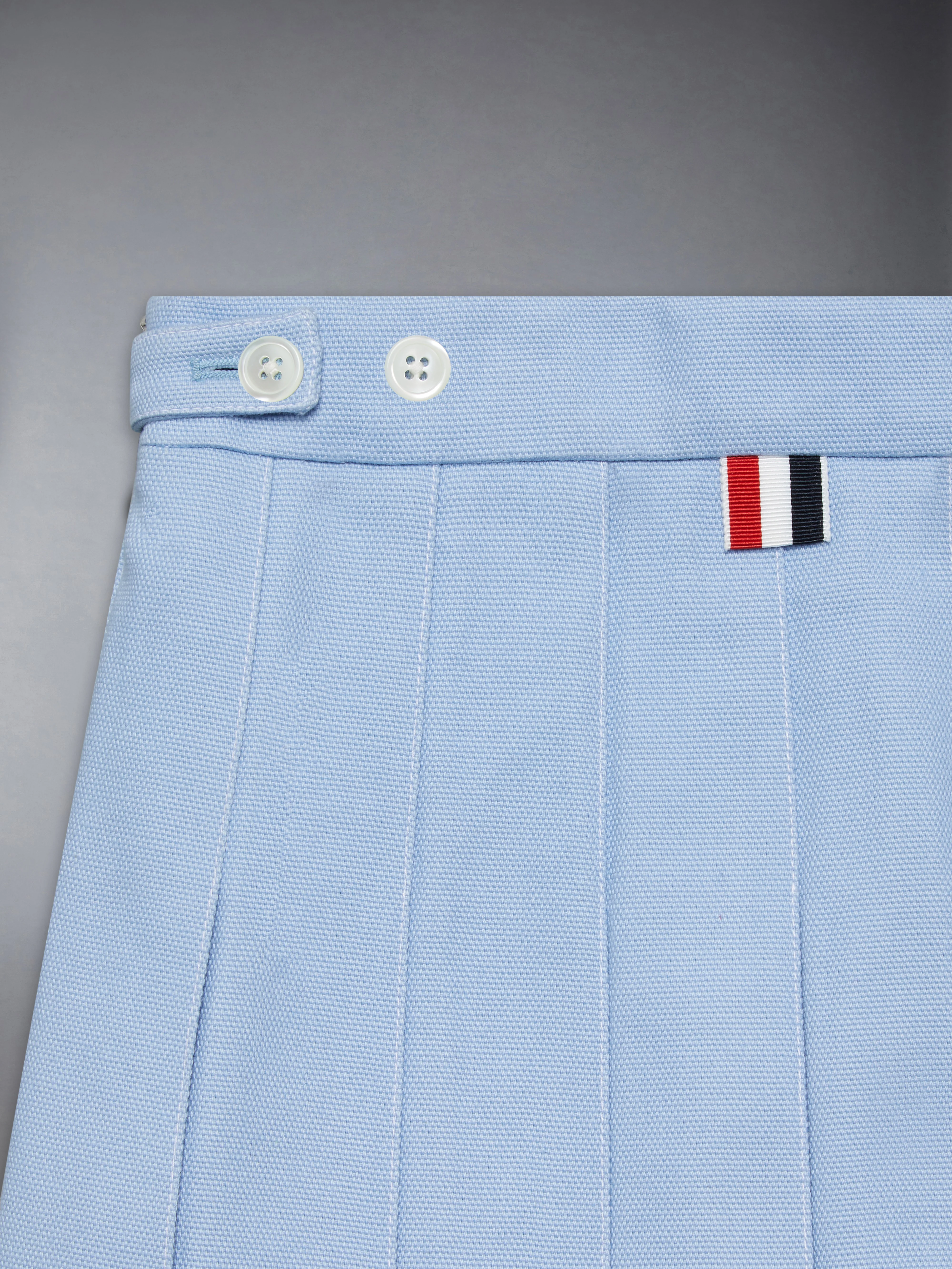 340-children-s-canvas-pleated-mini-skirt-4.webp CHILDREN'S CANVAS PLEATED MINI SKIRT