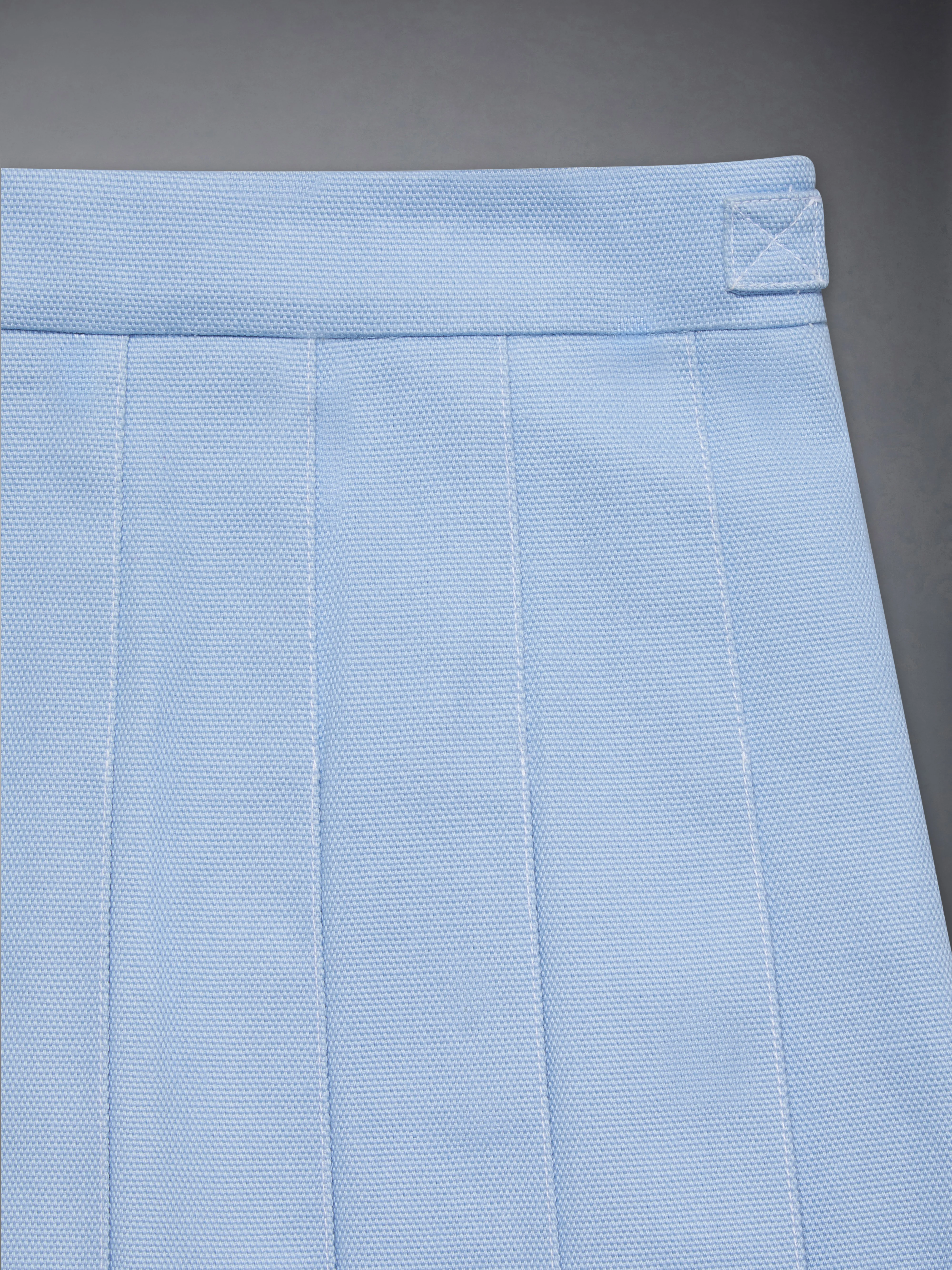 340-children-s-canvas-pleated-mini-skirt-5.webp CHILDREN'S CANVAS PLEATED MINI SKIRT
