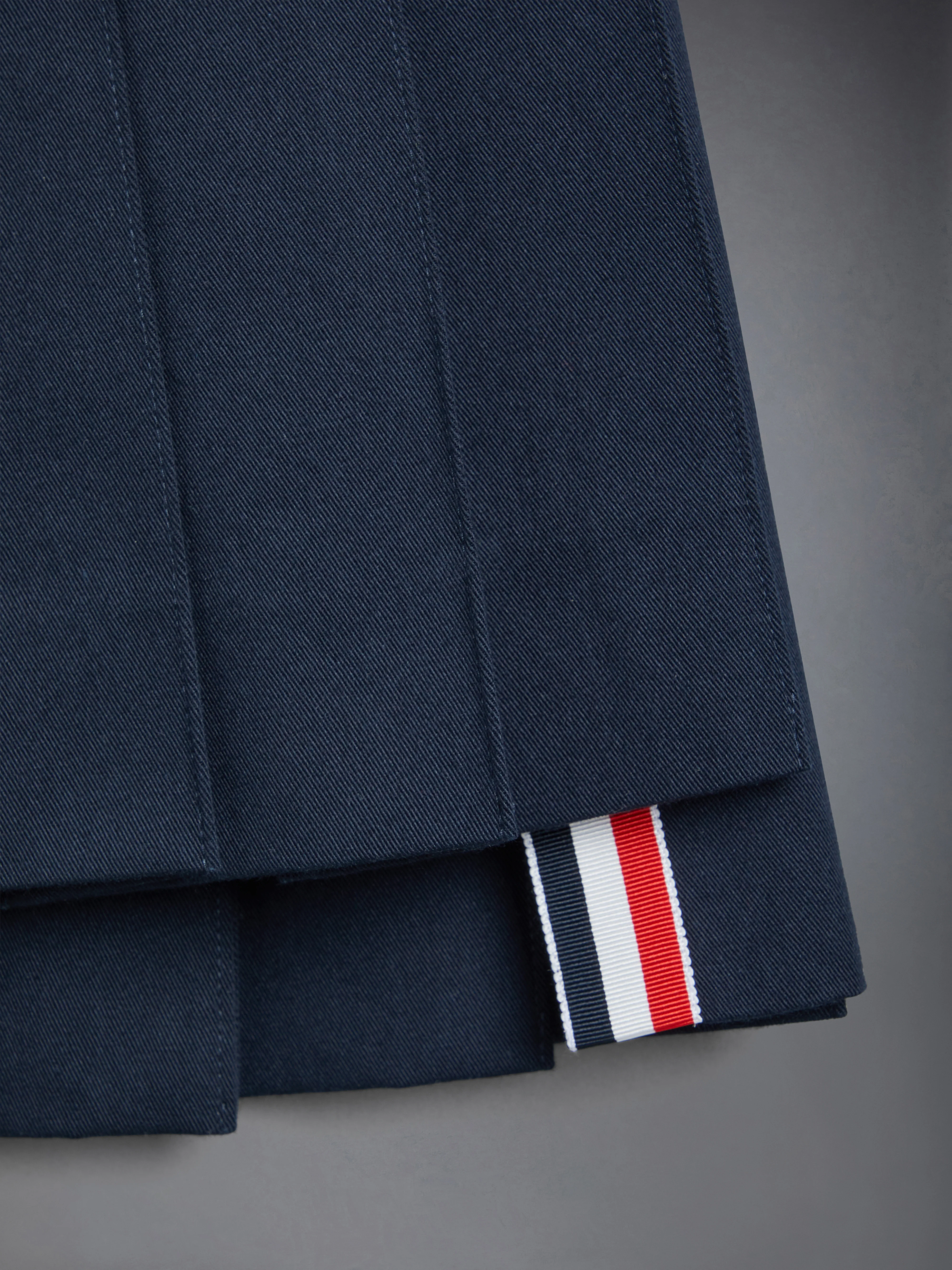 3491-children-s-cotton-4-bar-pleated-mini-skirt-4.webp CHILDREN'S COTTON 4-BAR PLEATED MINI SKIRT