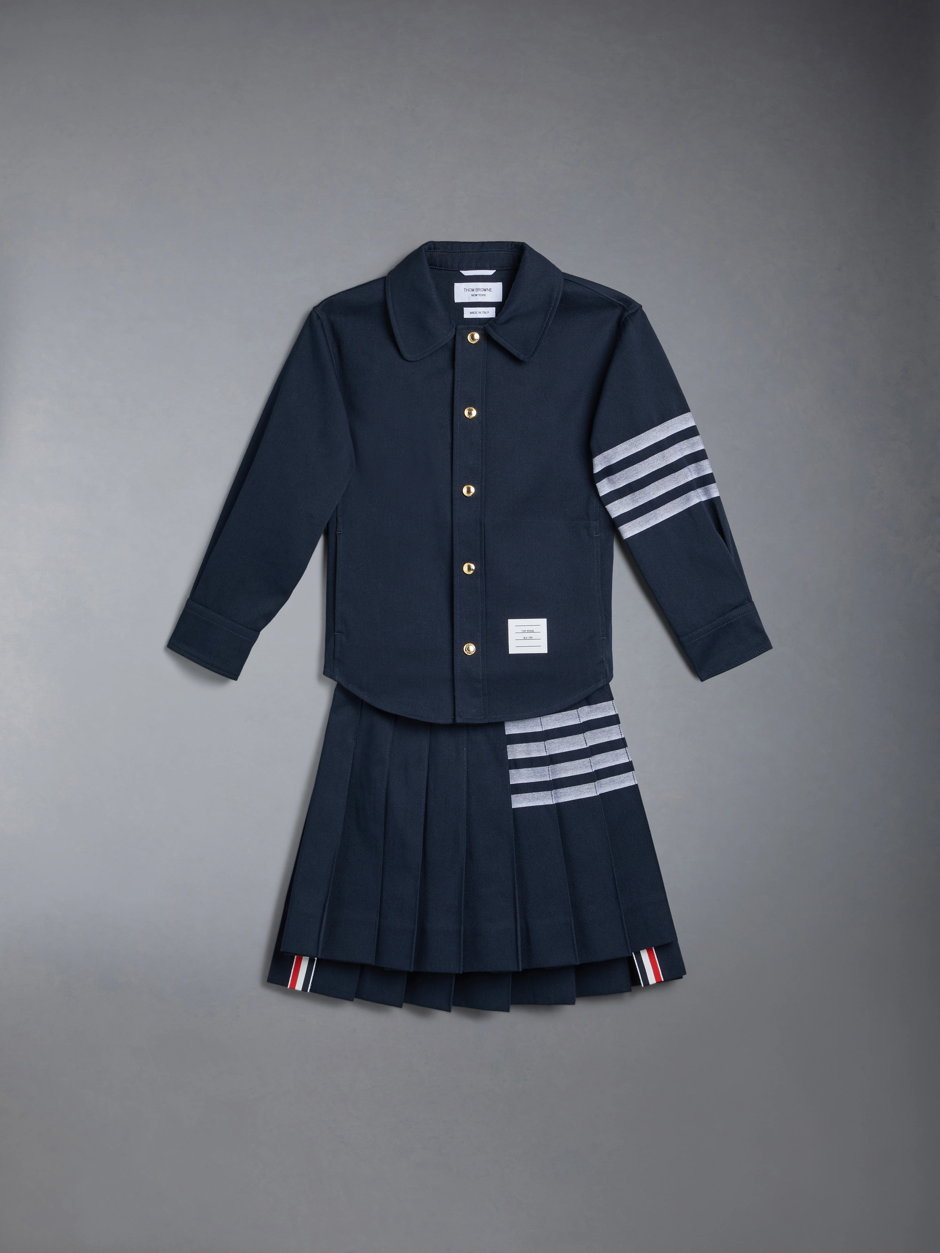 3491-children-s-cotton-4-bar-pleated-mini-skirt-6.webp CHILDREN'S COTTON 4-BAR PLEATED MINI SKIRT
