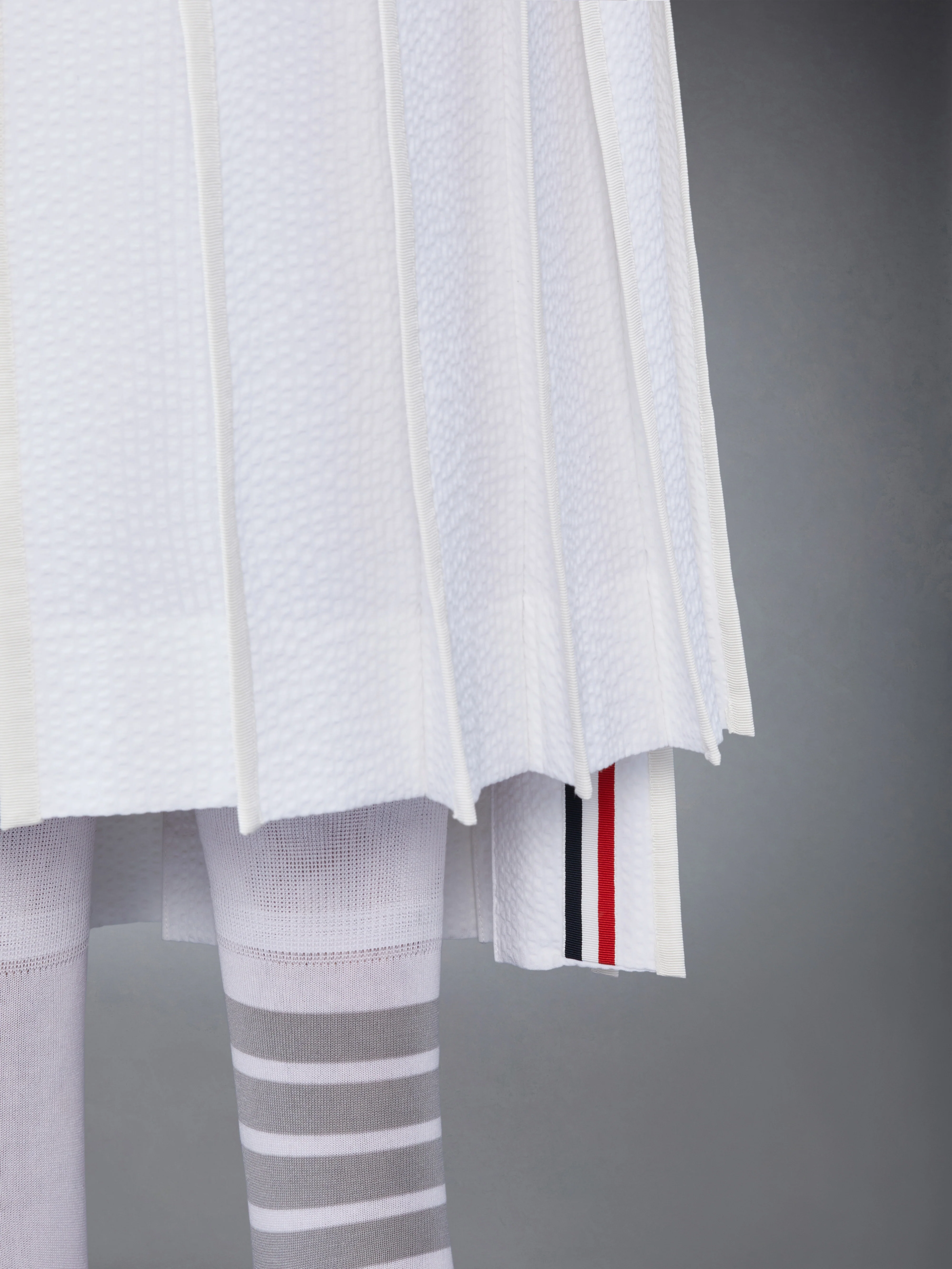 6192-cotton-seersucker-pleated-skirt-3.webp COTTON SEERSUCKER PLEATED SKIRT