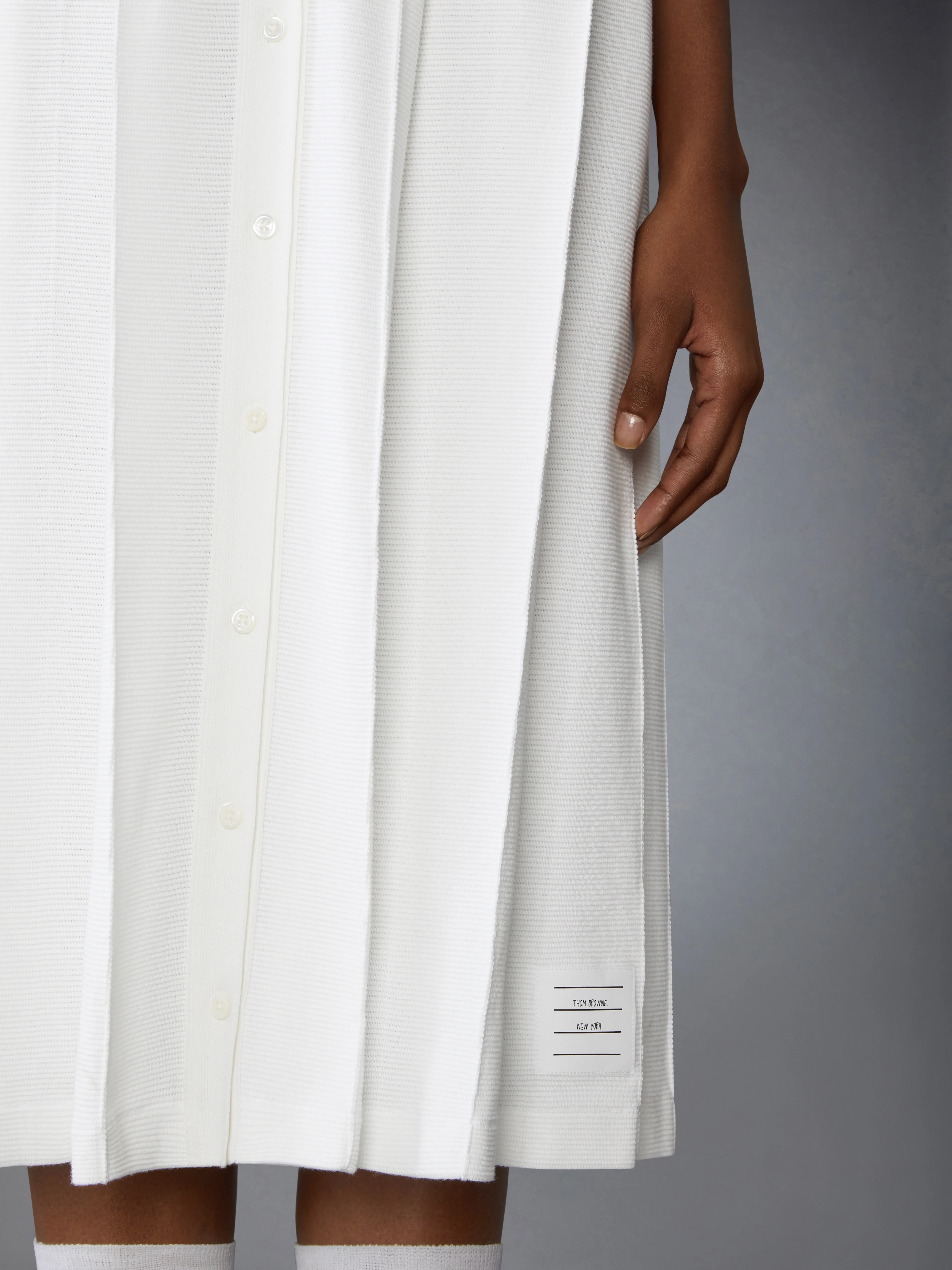 6403-cotton-waffle-pleated-polo-dress-6.webp COTTON WAFFLE PLEATED POLO DRESS