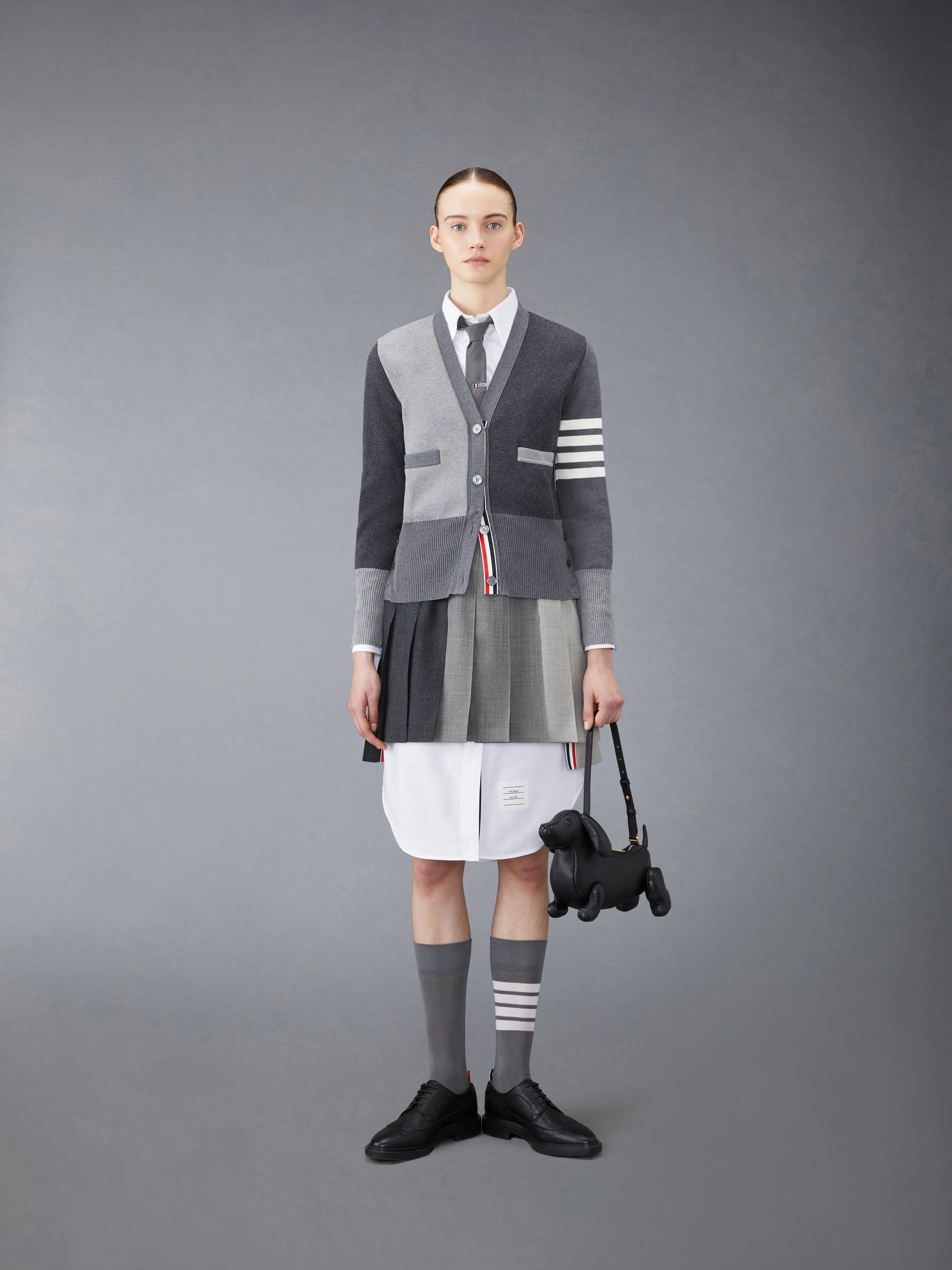 7491-funmix-wool-fresco-classic-mini-pleated-skirt-4.webp FUNMIX WOOL FRESCO CLASSIC MINI PLEATED SKIRT