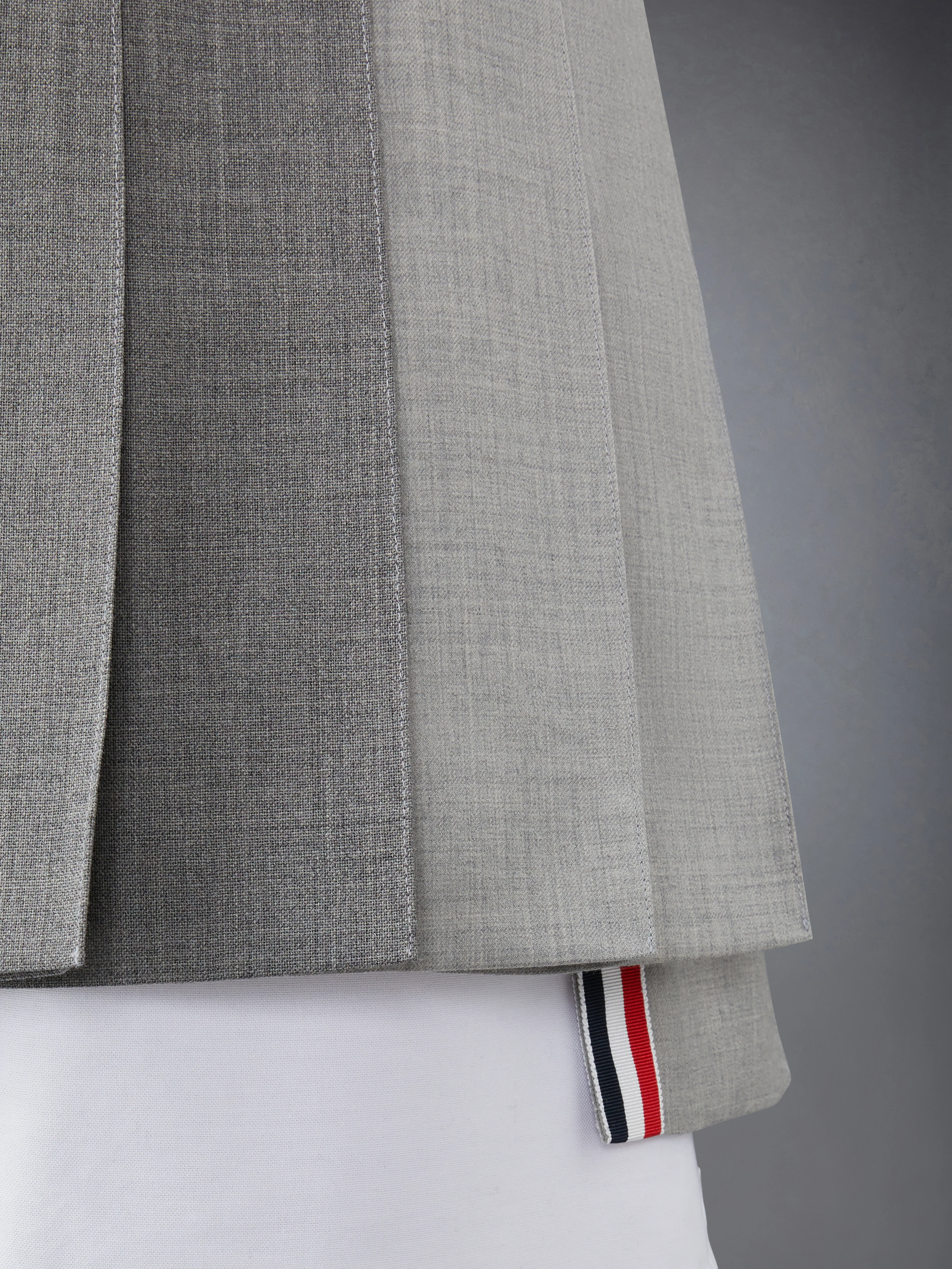 7491-funmix-wool-fresco-classic-mini-pleated-skirt-5.webp FUNMIX WOOL FRESCO CLASSIC MINI PLEATED SKIRT