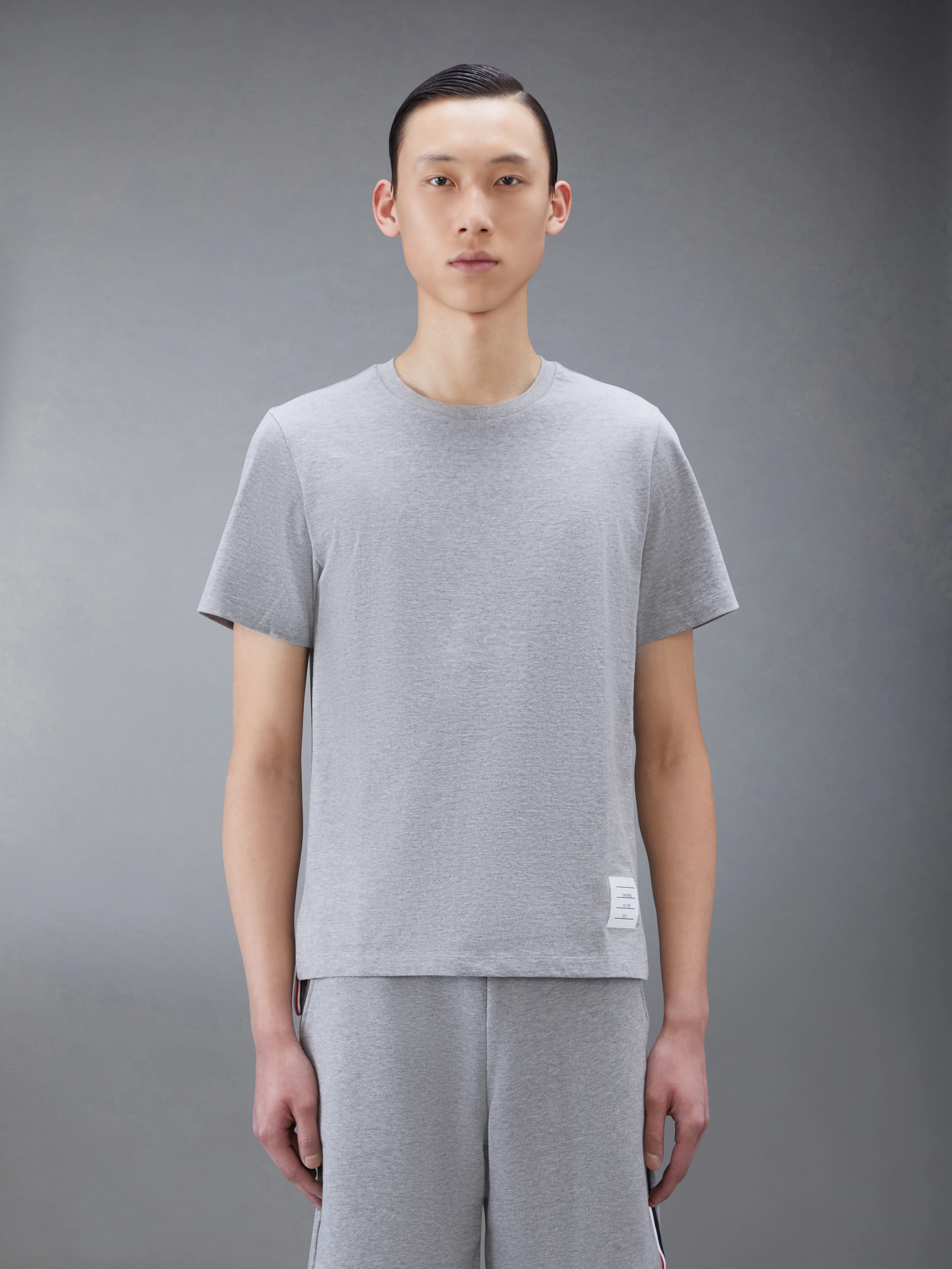 8028-jersey-relaxed-side-slit-tee-1.webp JERSEY RELAXED SIDE SLIT TEE