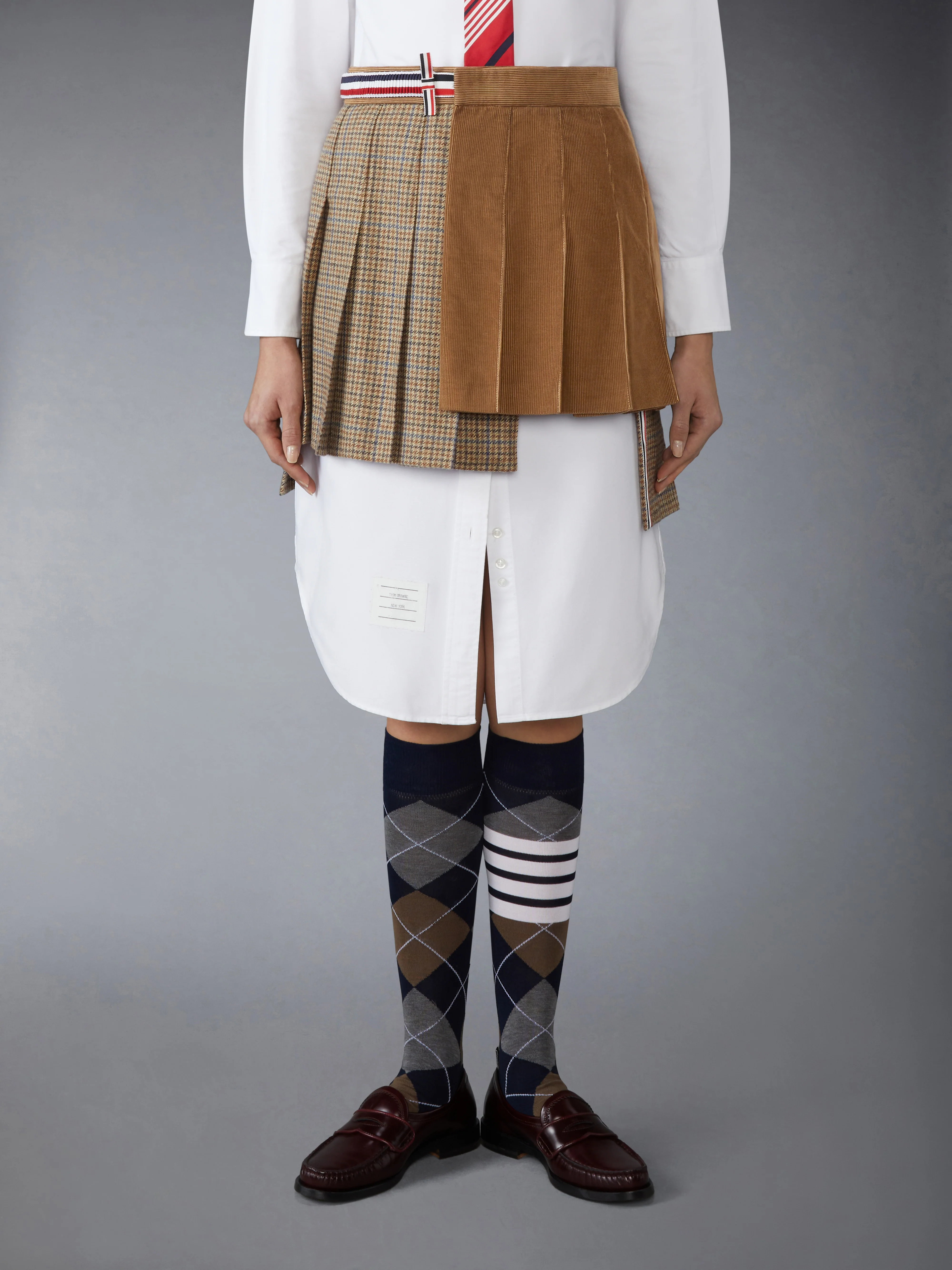 GUNCLUB CHECK CHEVIOT TWEED PLEATED MINI SKIRT