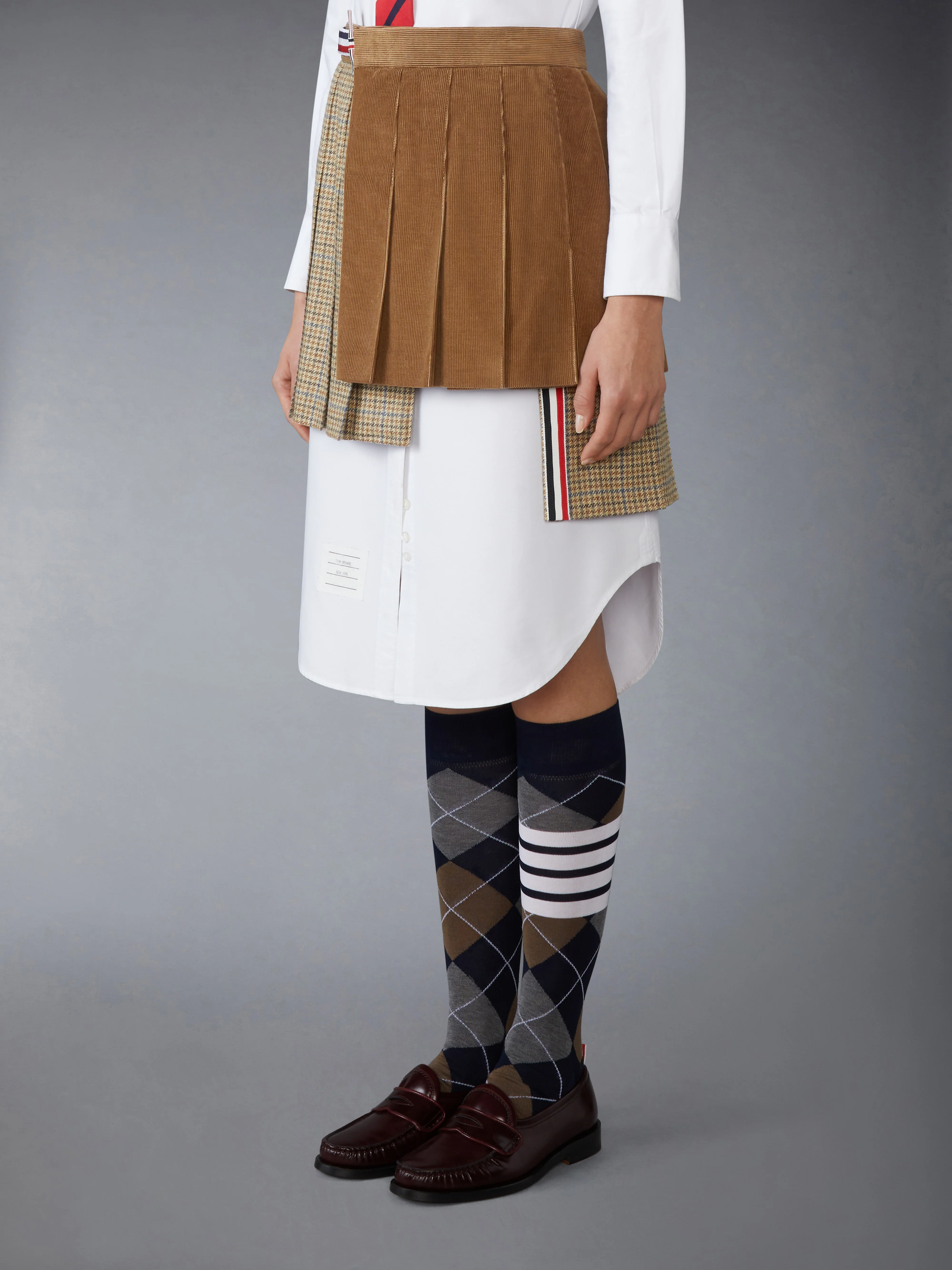 GUNCLUB CHECK CHEVIOT TWEED PLEATED MINI SKIRT