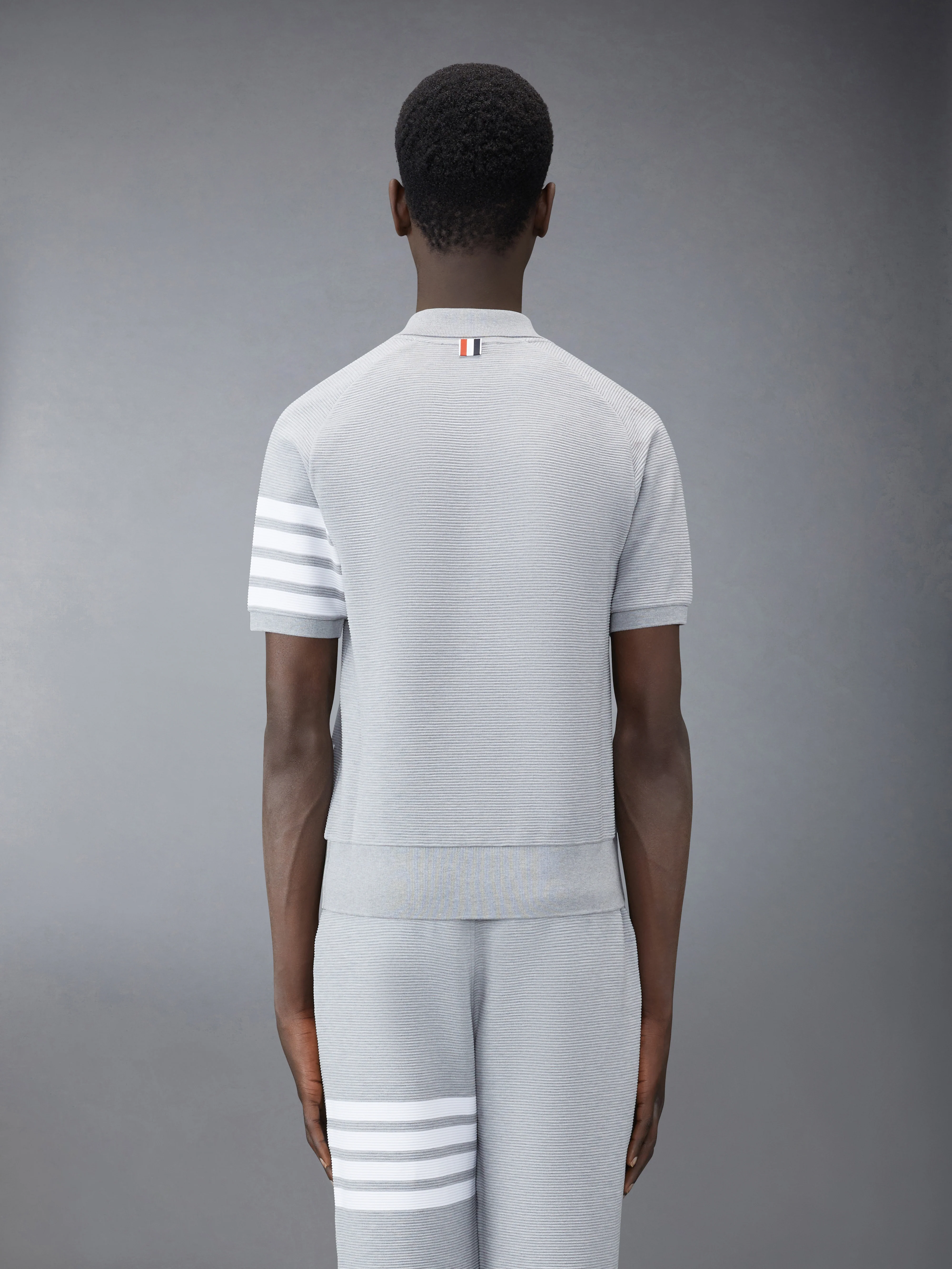 9388-ottoman-4-bar-saddle-sleeve-polo-2.webp OTTOMAN 4-BAR SADDLE SLEEVE POLO
