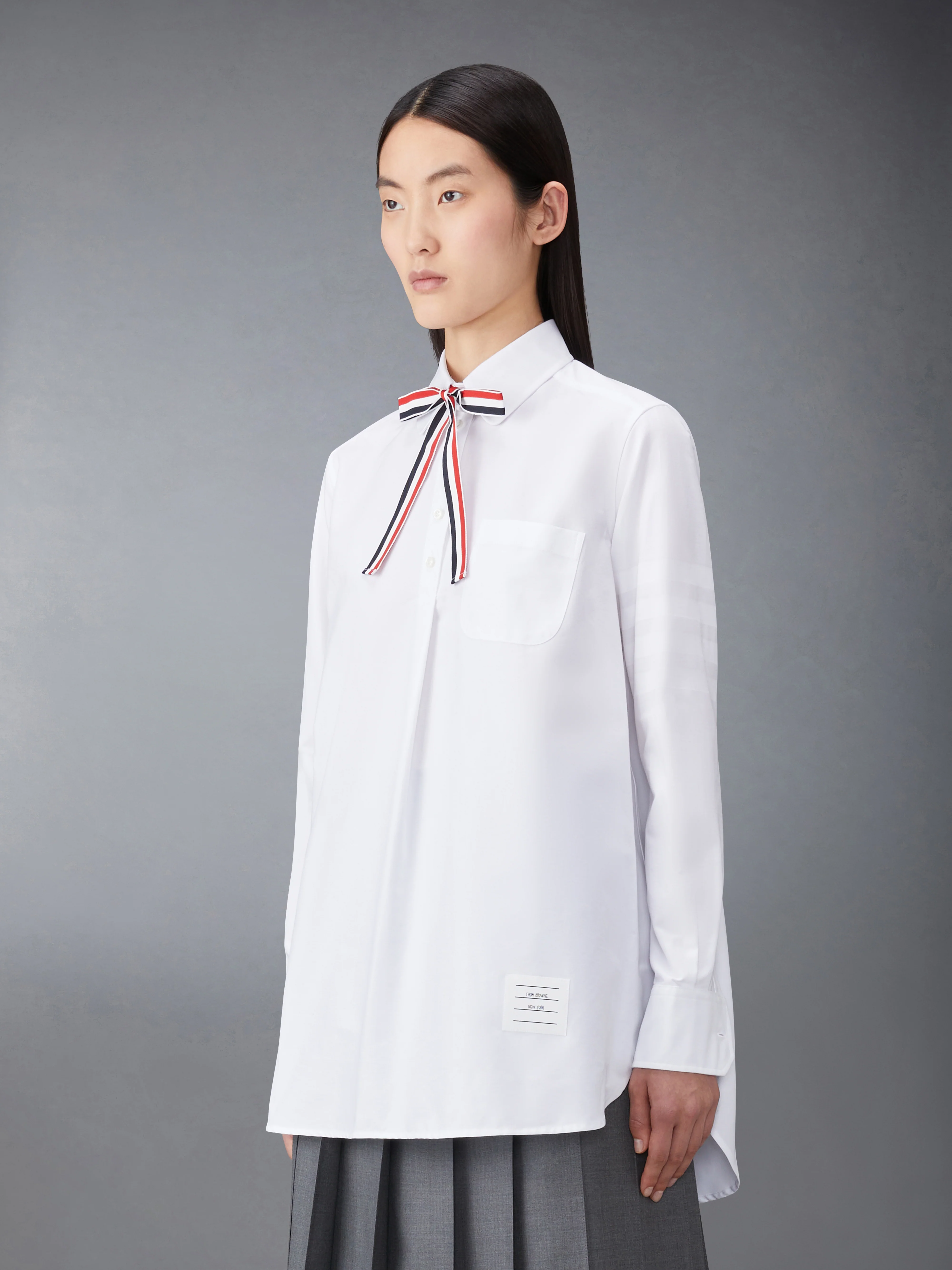 OXFORD 4-BAR BOW TIE BLOUSON