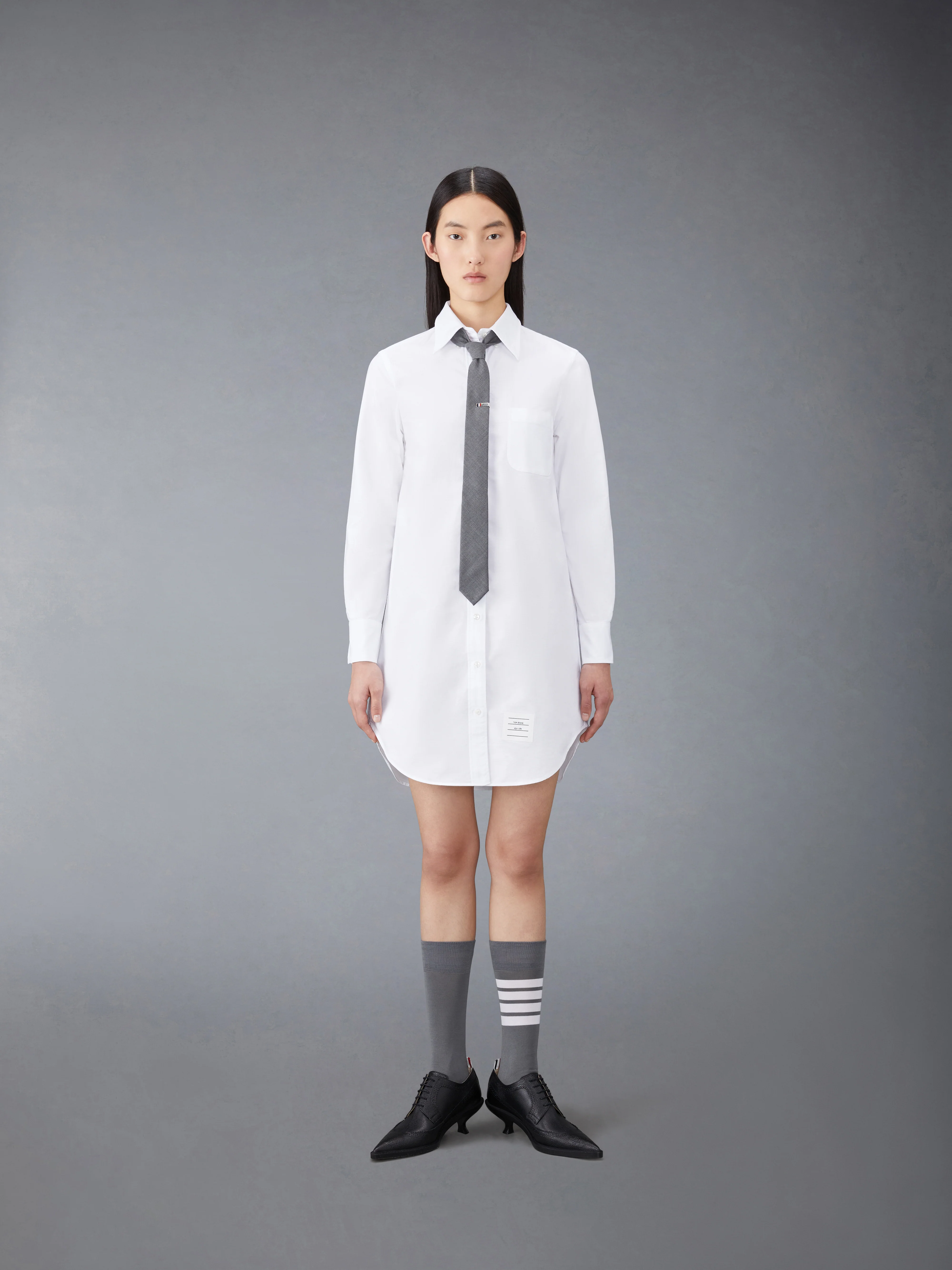 9717-oxford-grosgrain-placket-mini-shirtdress-5.webp OXFORD GROSGRAIN PLACKET MINI SHIRTDRESS