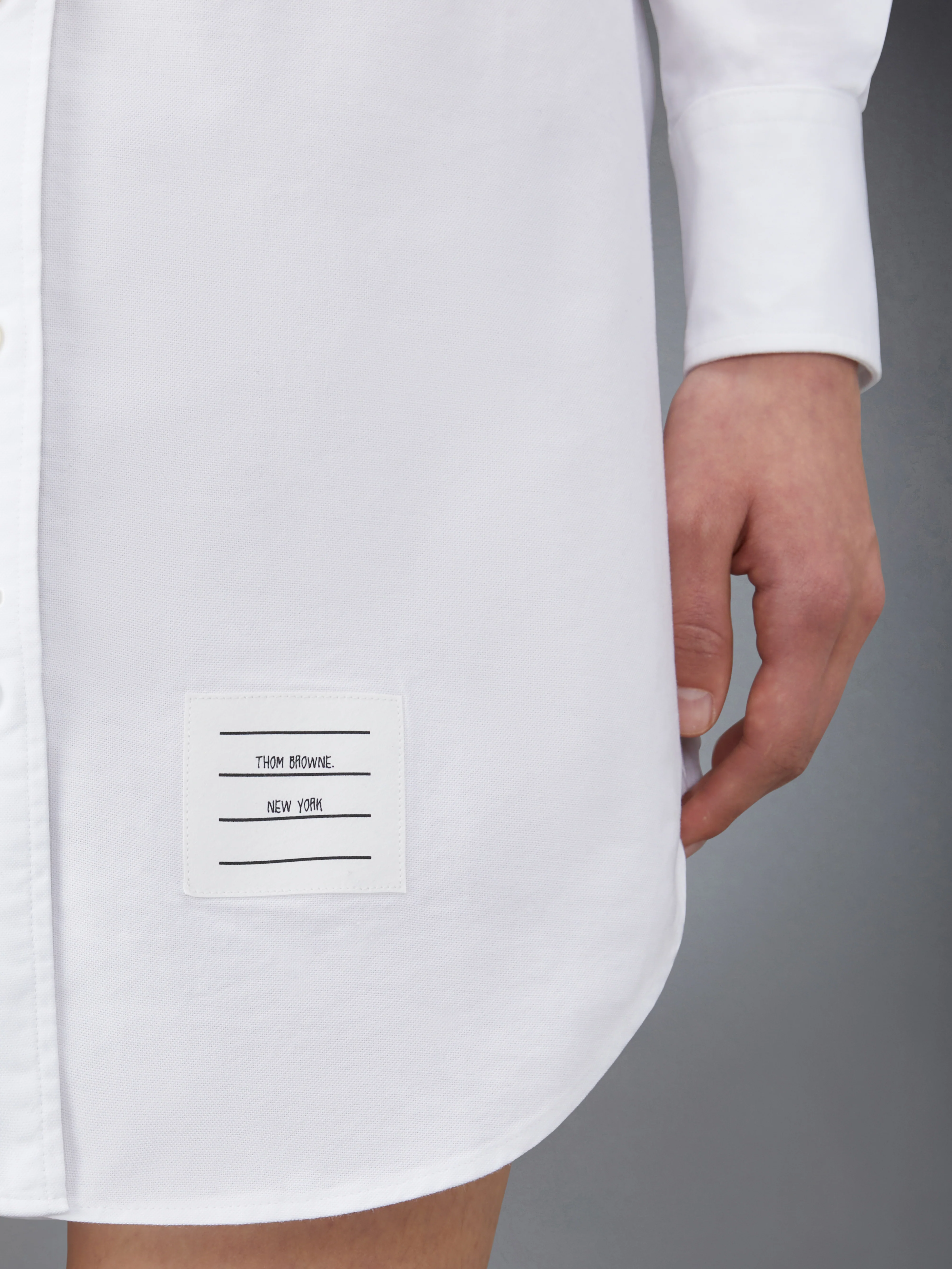 9717-oxford-grosgrain-placket-mini-shirtdress-8.webp OXFORD GROSGRAIN PLACKET MINI SHIRTDRESS
