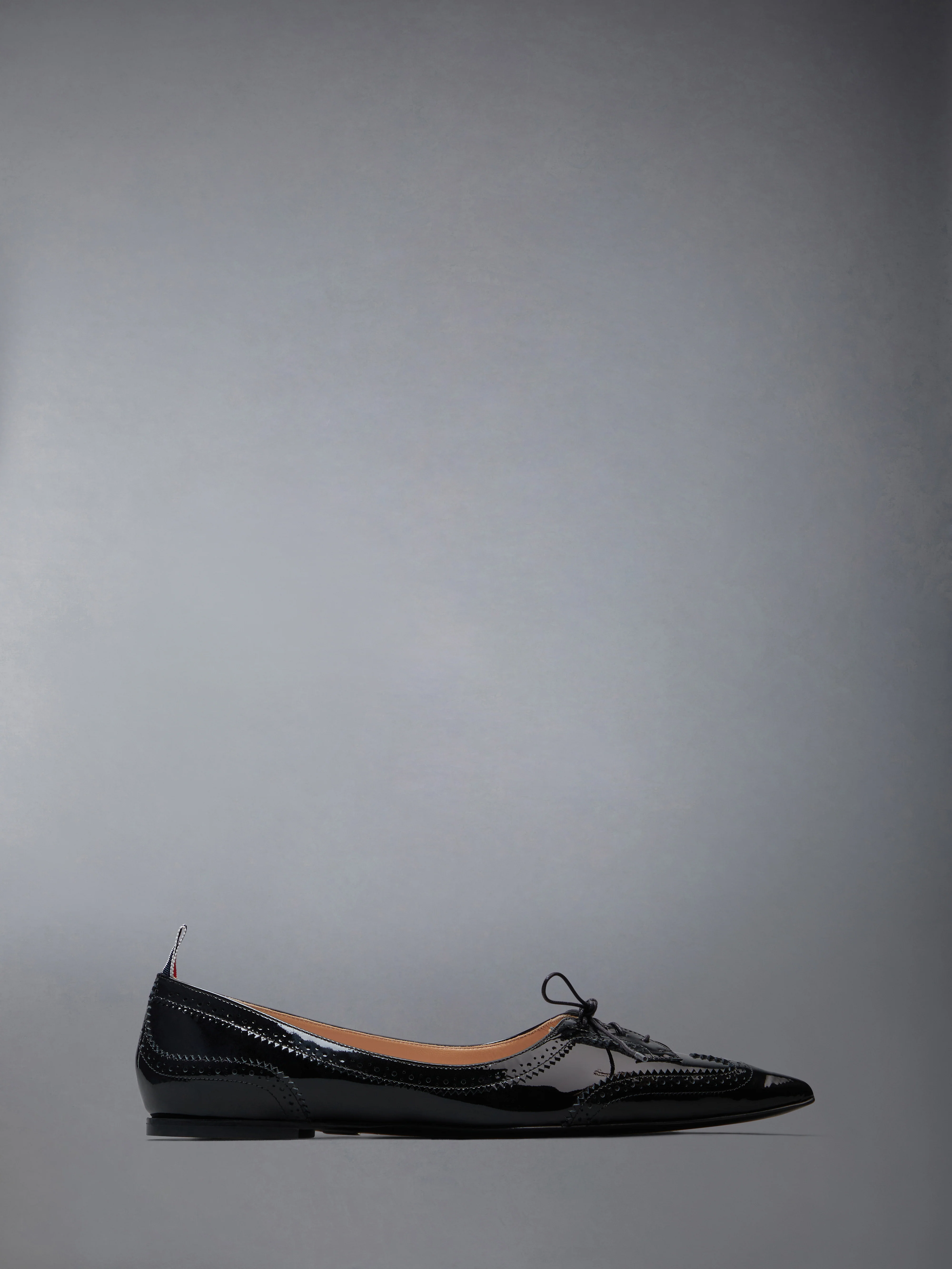 PATENT POINTED WINGTIP BALLERINA